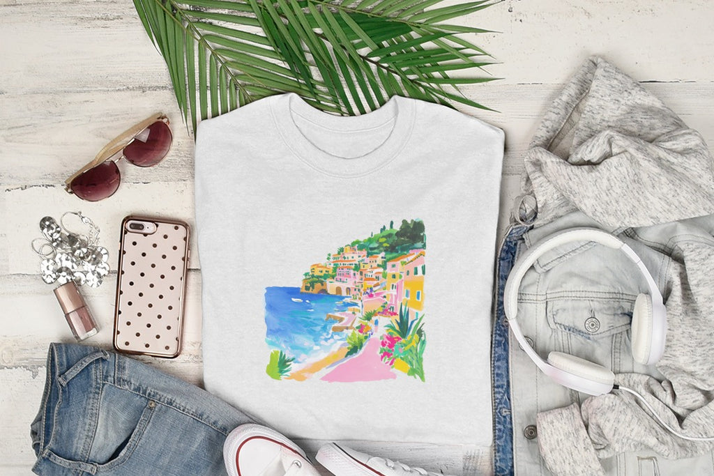 White crewneck t-shirt with colorful coastal town watercolor print.