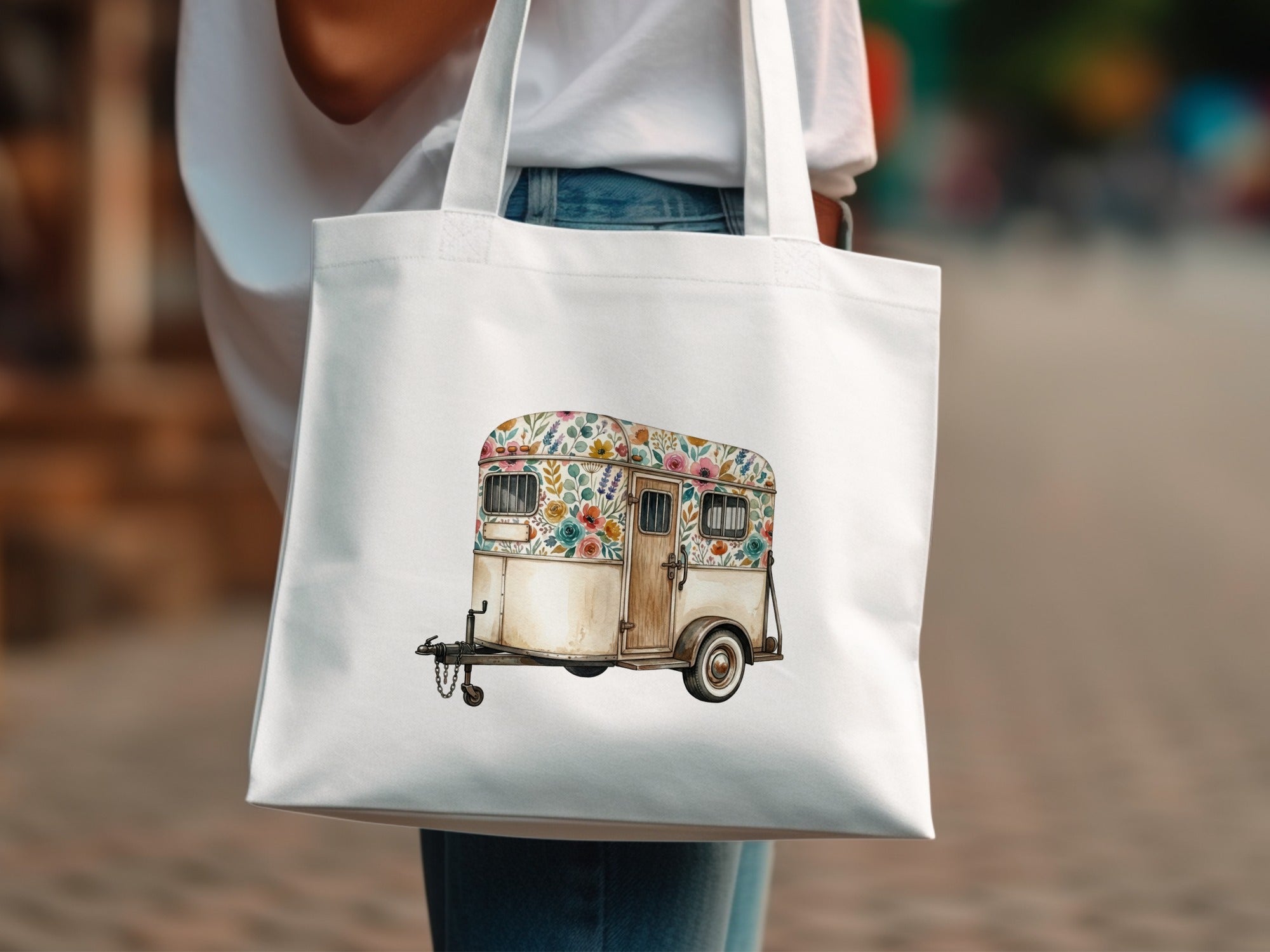 White tote bag with a floral trailer illustration.