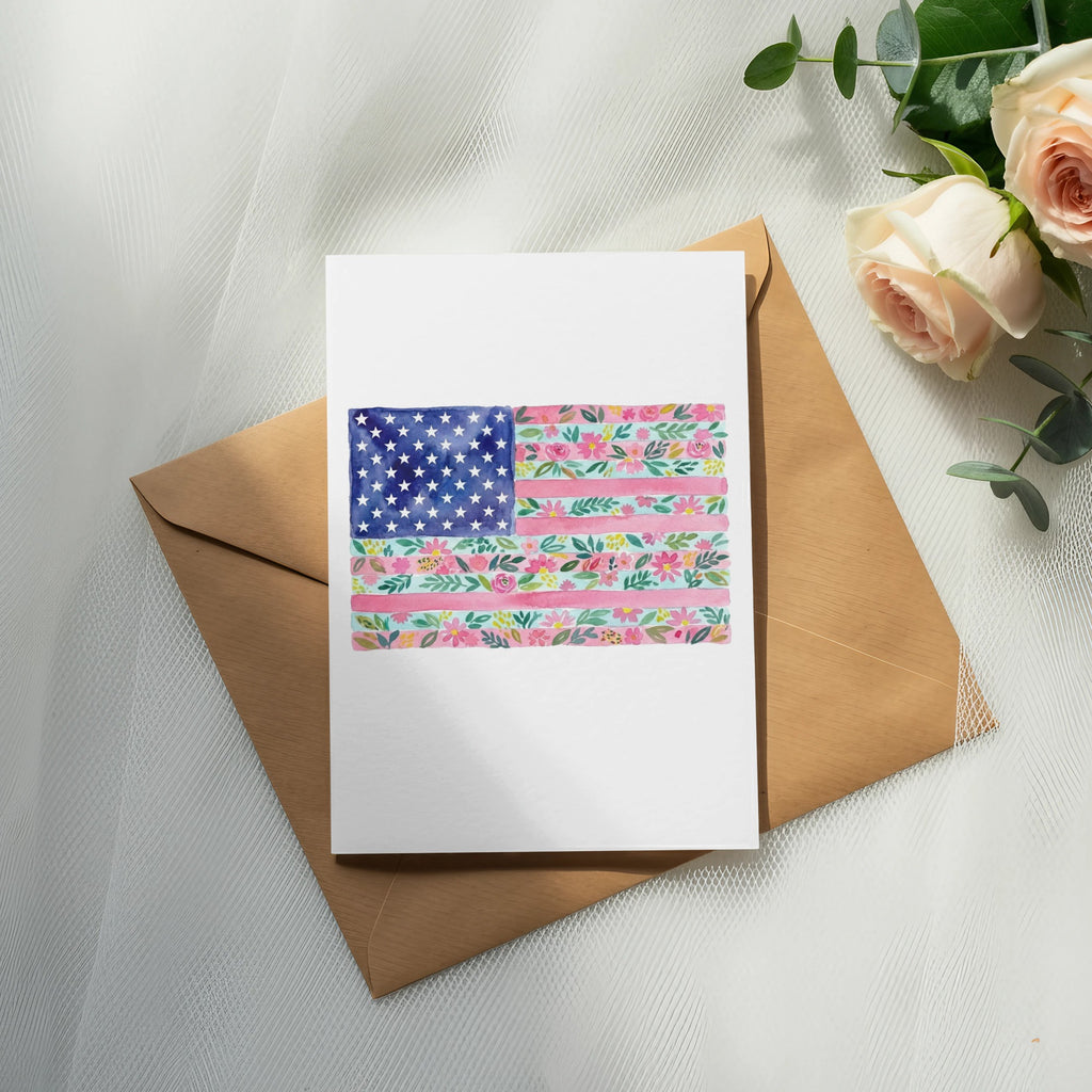 Watercolor US flag card with floral pattern, on brown envelope.