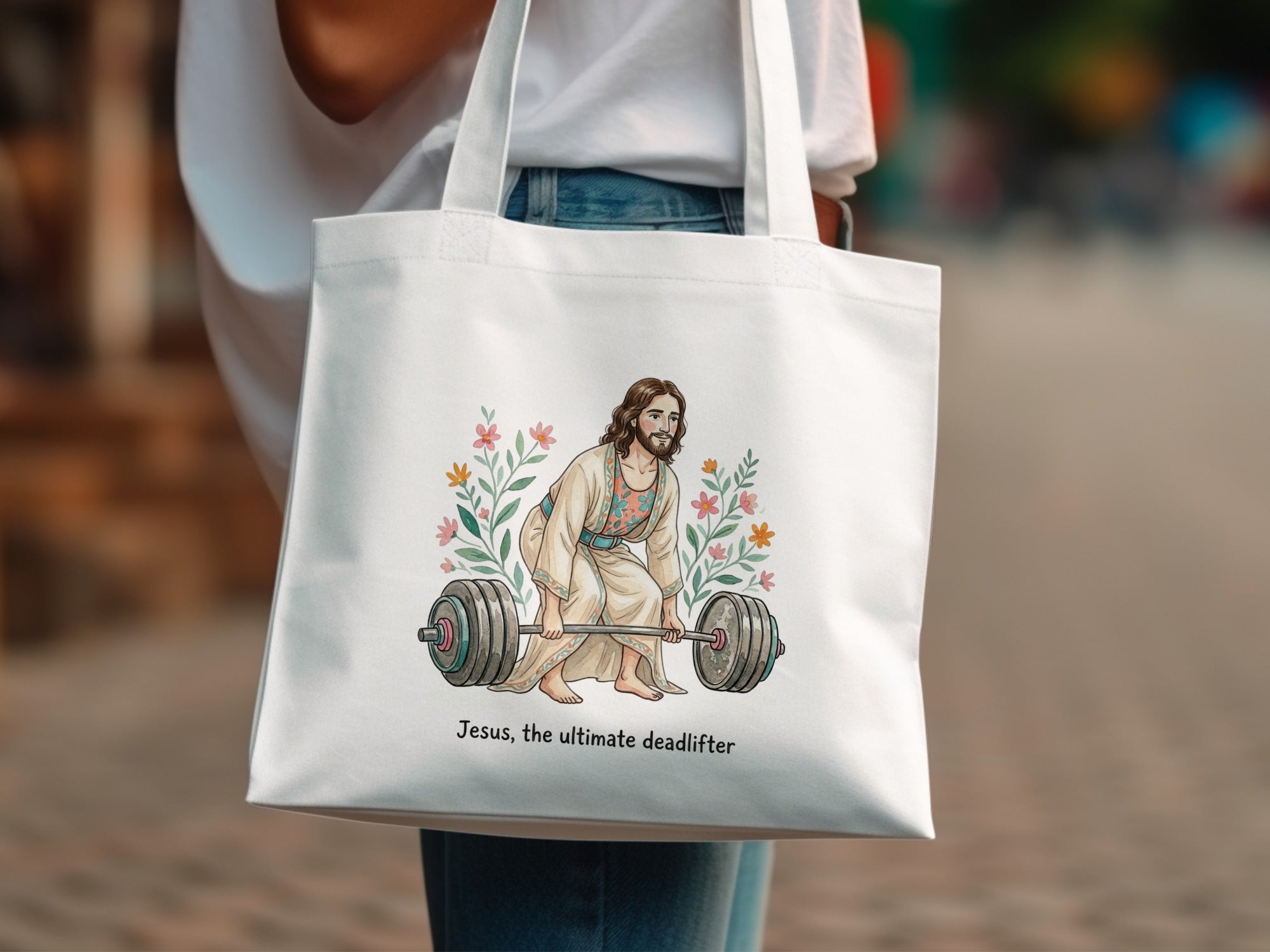 Jesus deadlifting a barbell with flowers, text "Jesus, the ultimate deadlifter".