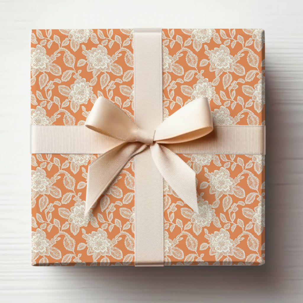 Elegant Floral Patterned Gift Wrap with Beige Ribbon