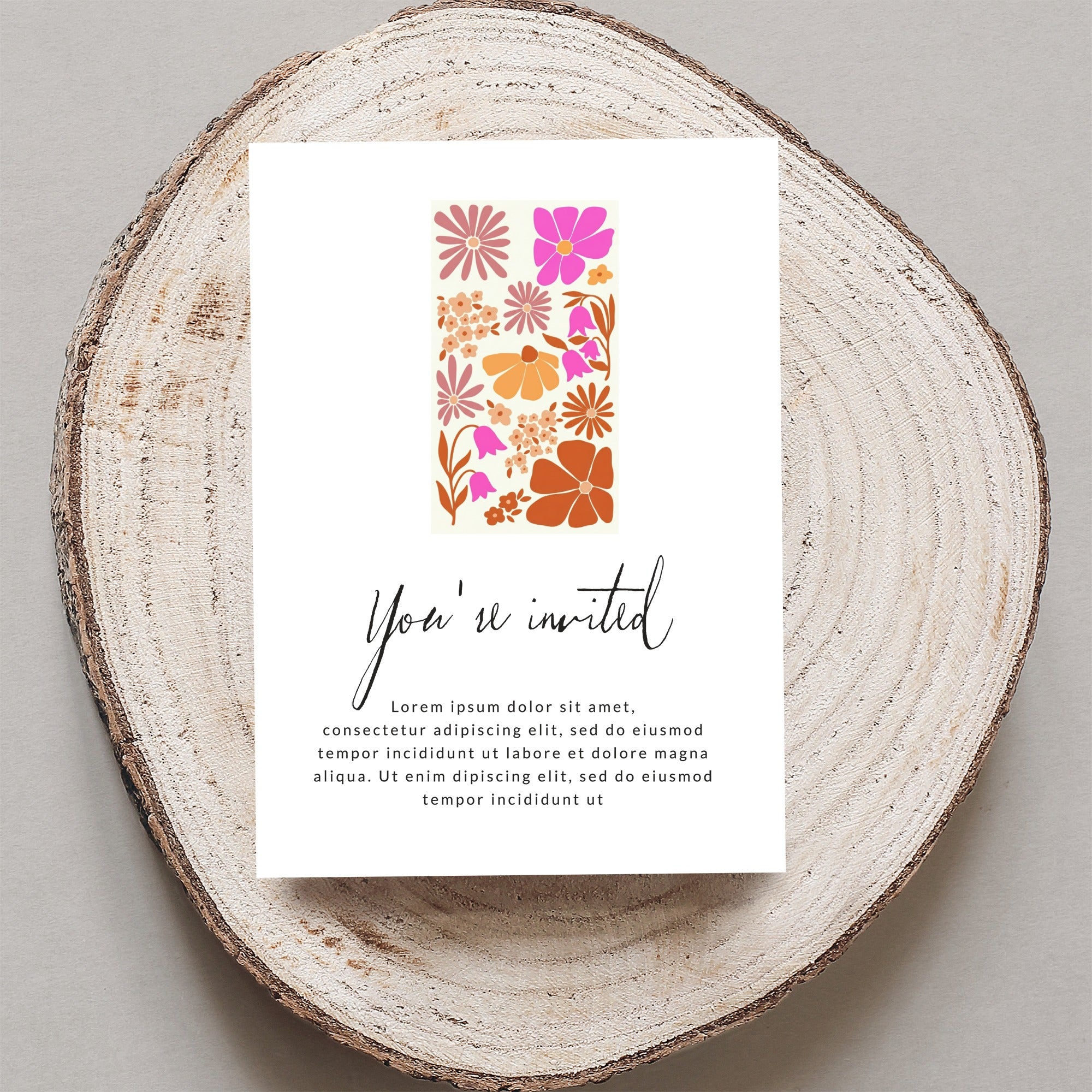 Invitation card with floral pattern and "You're invited" text.