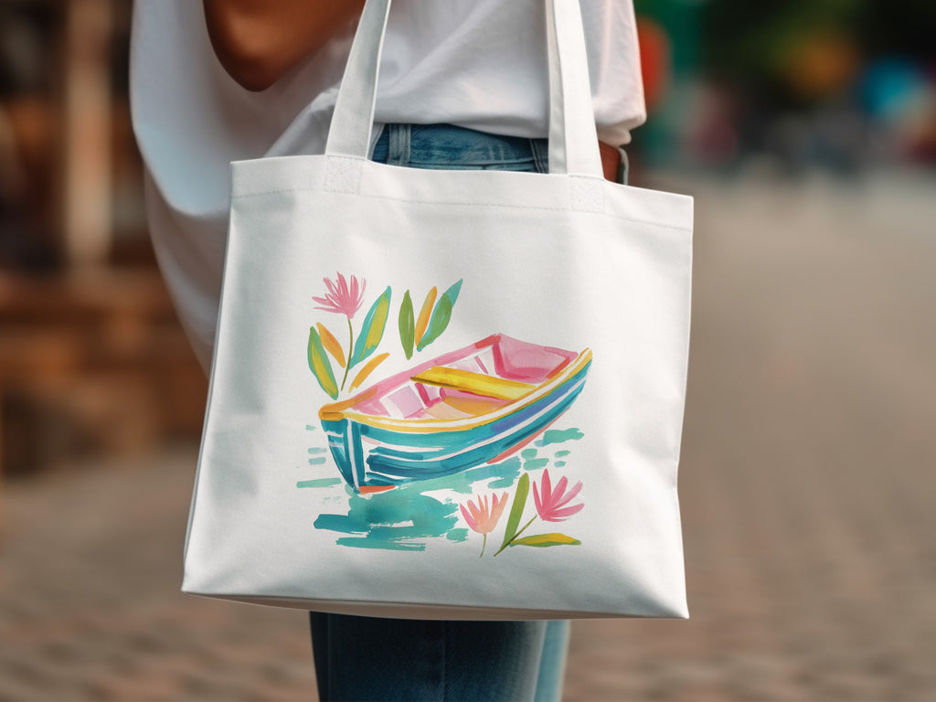 White tote bag with watercolor illustration of a colorful rowboat and flowers.