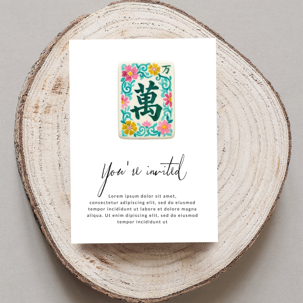 Mahjong tile with Chinese characters, inviting guests to an event.