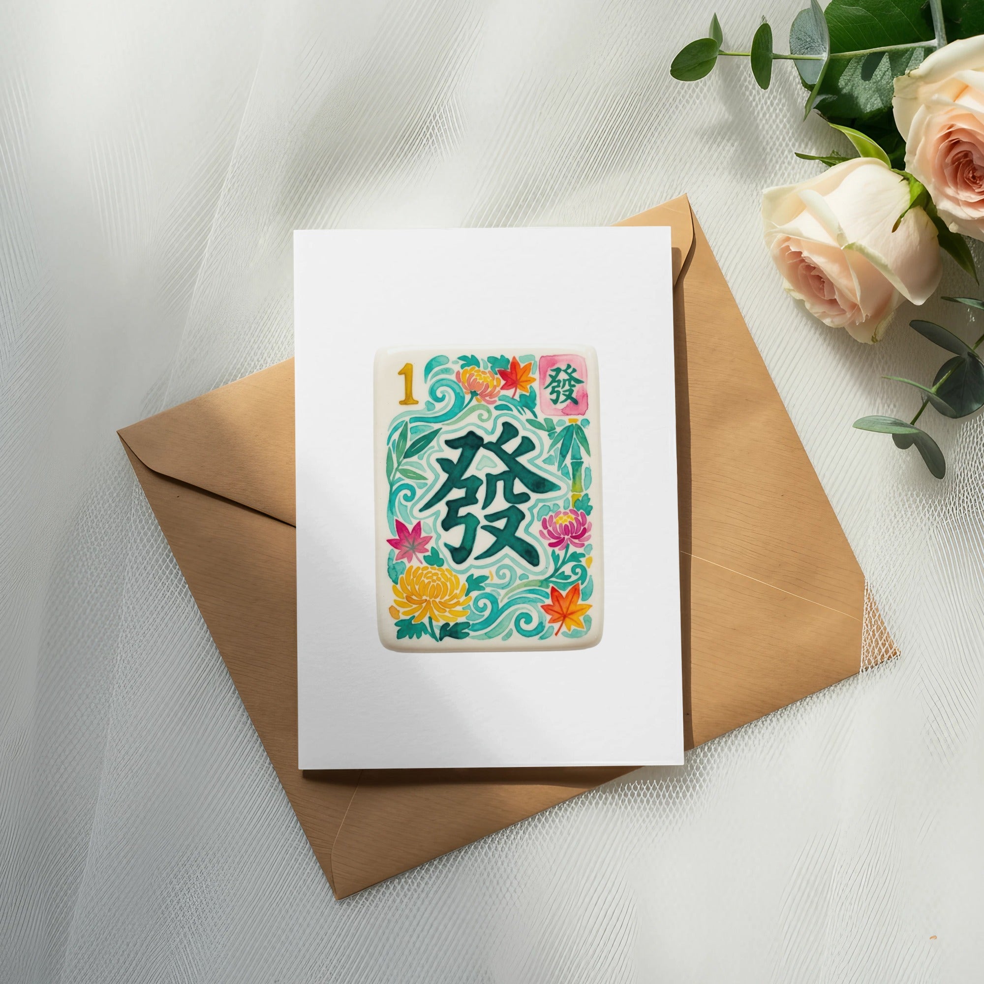 Mahjong tile with Chinese characters and floral decorations, on a card.