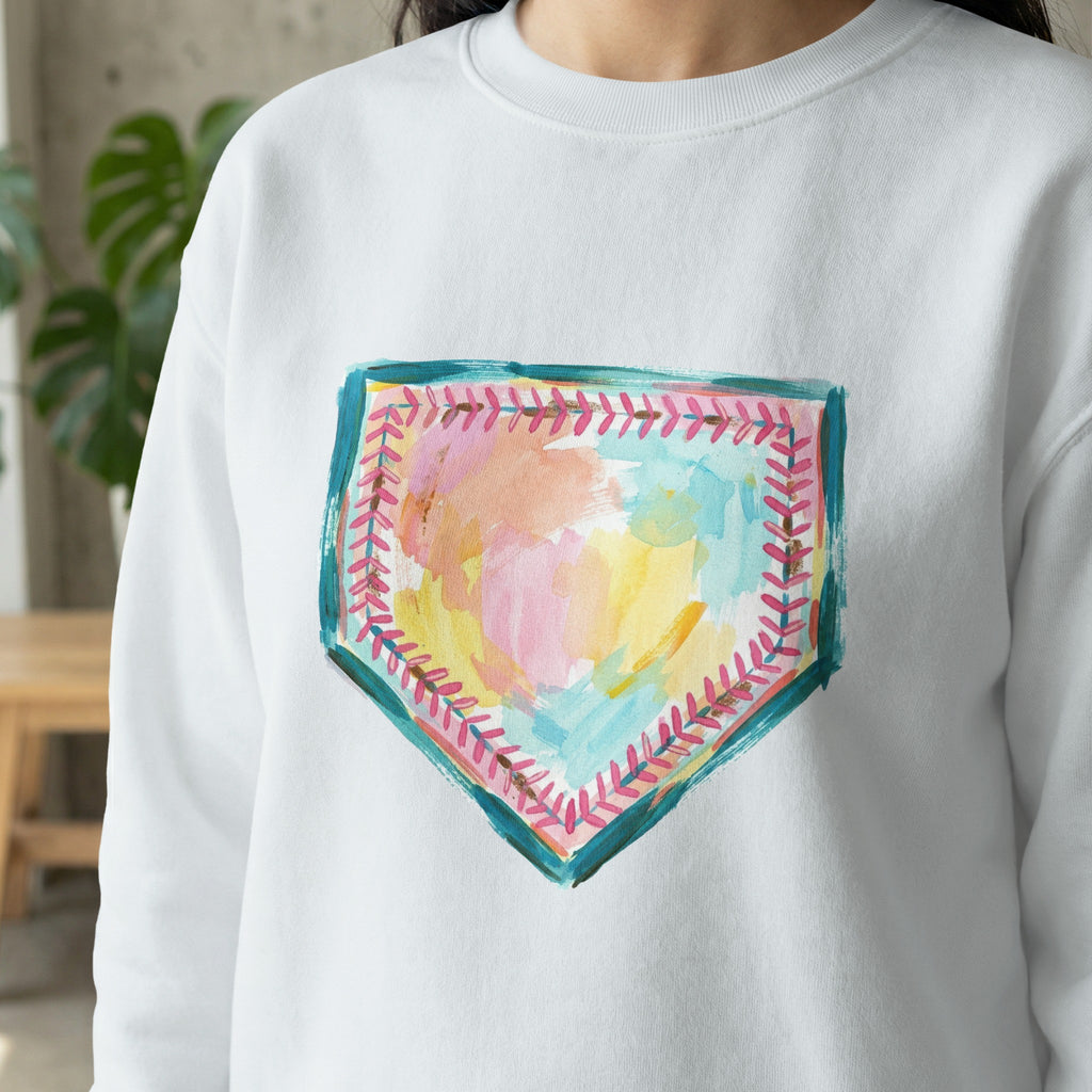 White sweatshirt with a watercolor baseball home plate design.