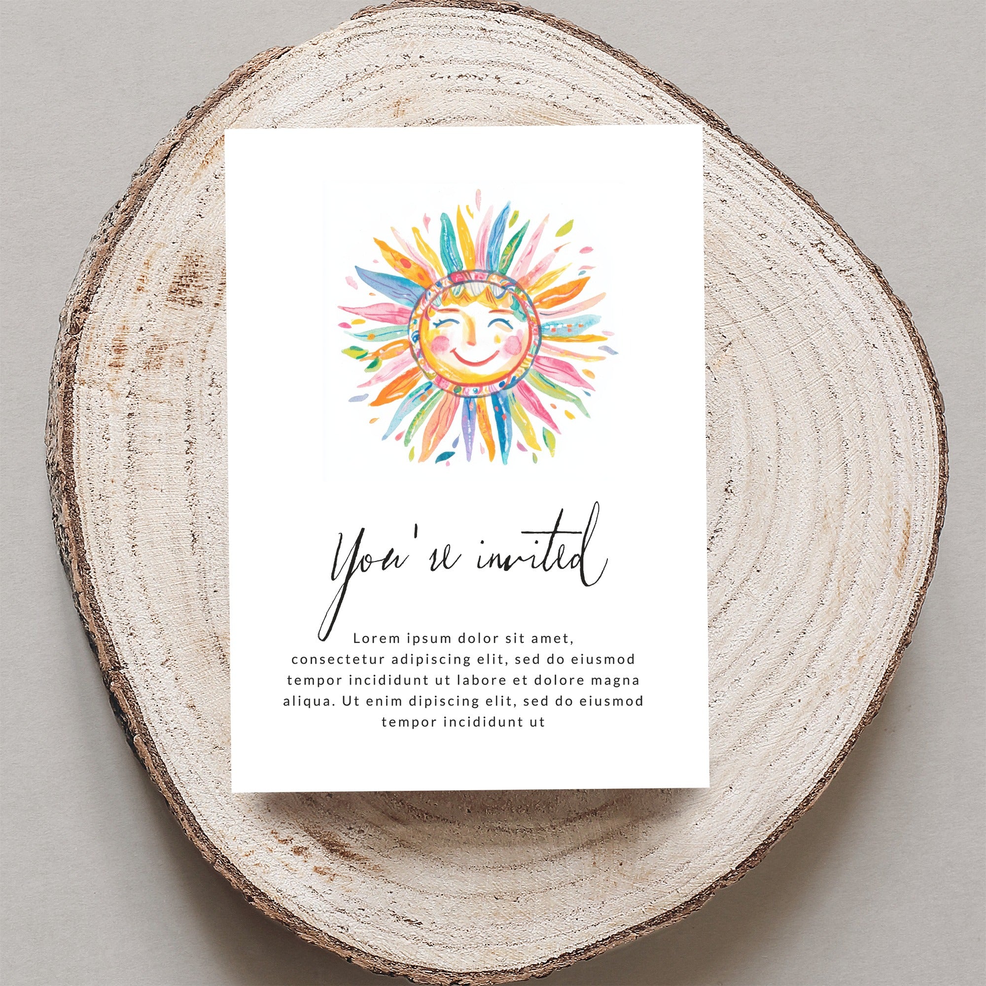 Invitation card with colorful smiling sun and "You're invited" text.
