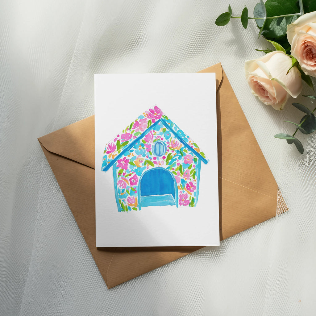 Watercolor dog house illustration on card with pink roses and eucalyptus.