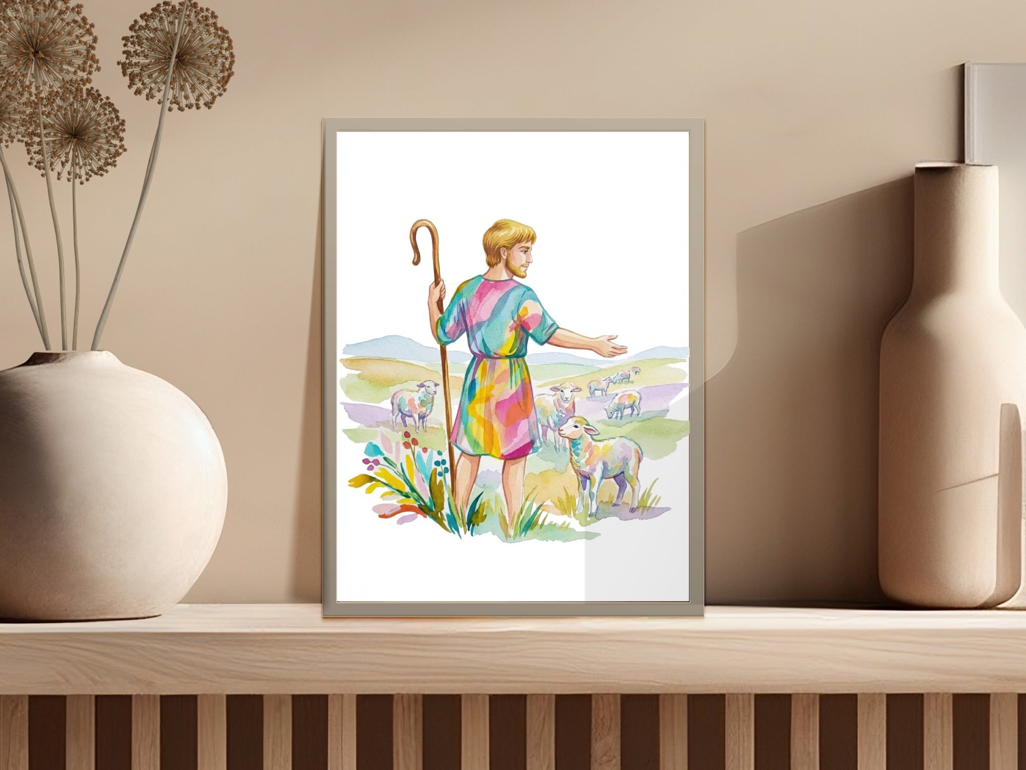 Shepherd with rainbow robe and sheep in a meadow.