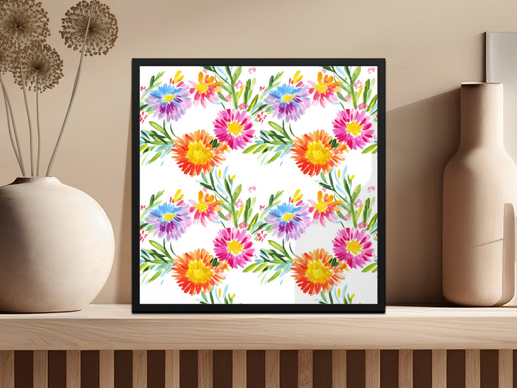 Framed artwork with colorful floral watercolor pattern on a shelf.