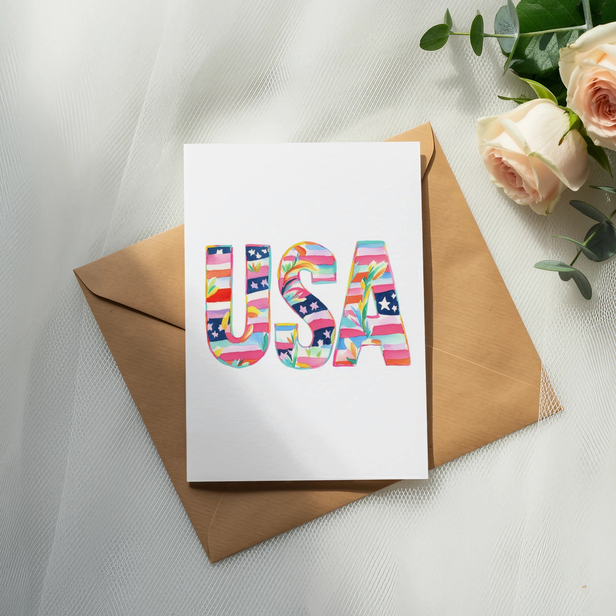 Card with colorful USA lettering on a brown envelope.