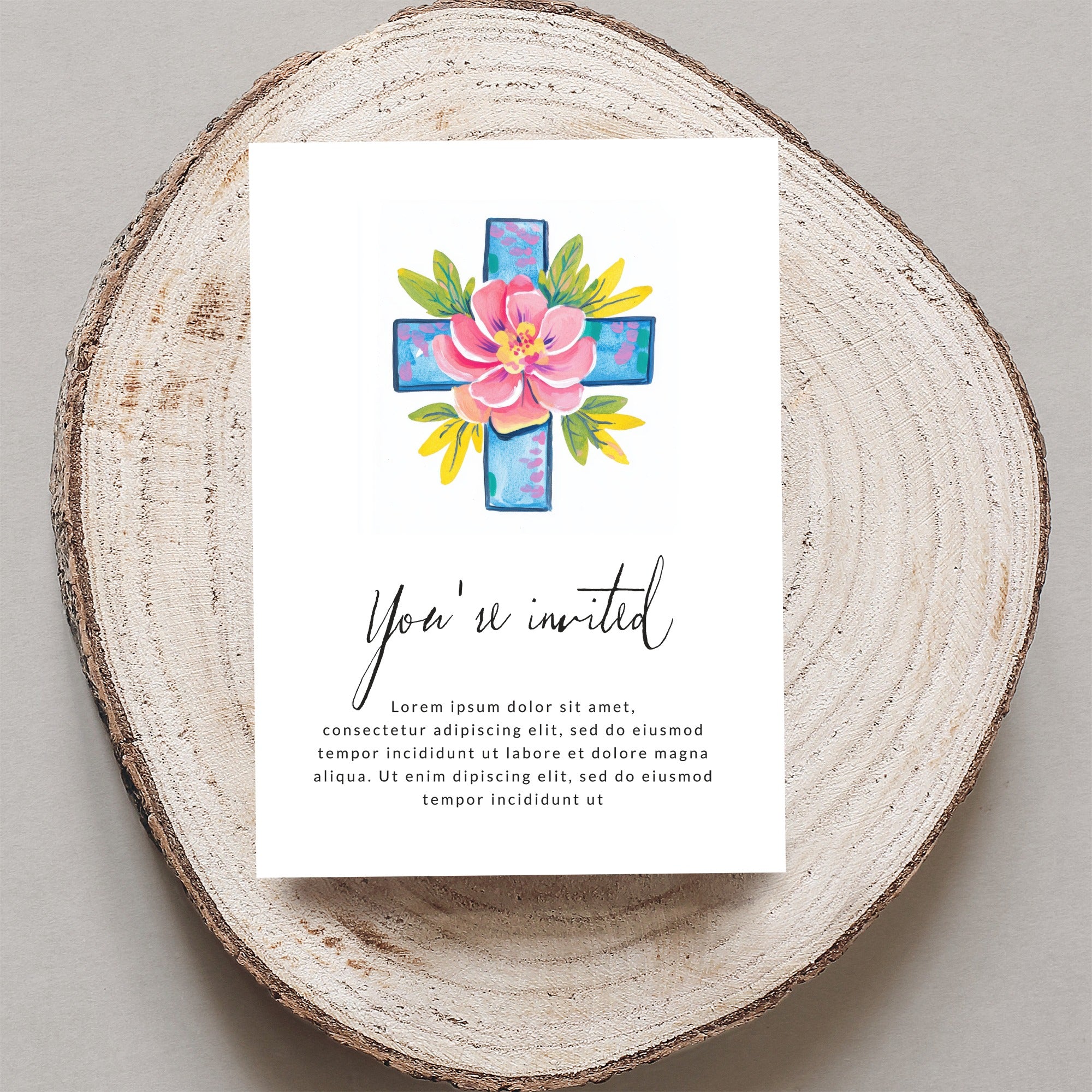 Invitation with floral cross and "You're invited" text.