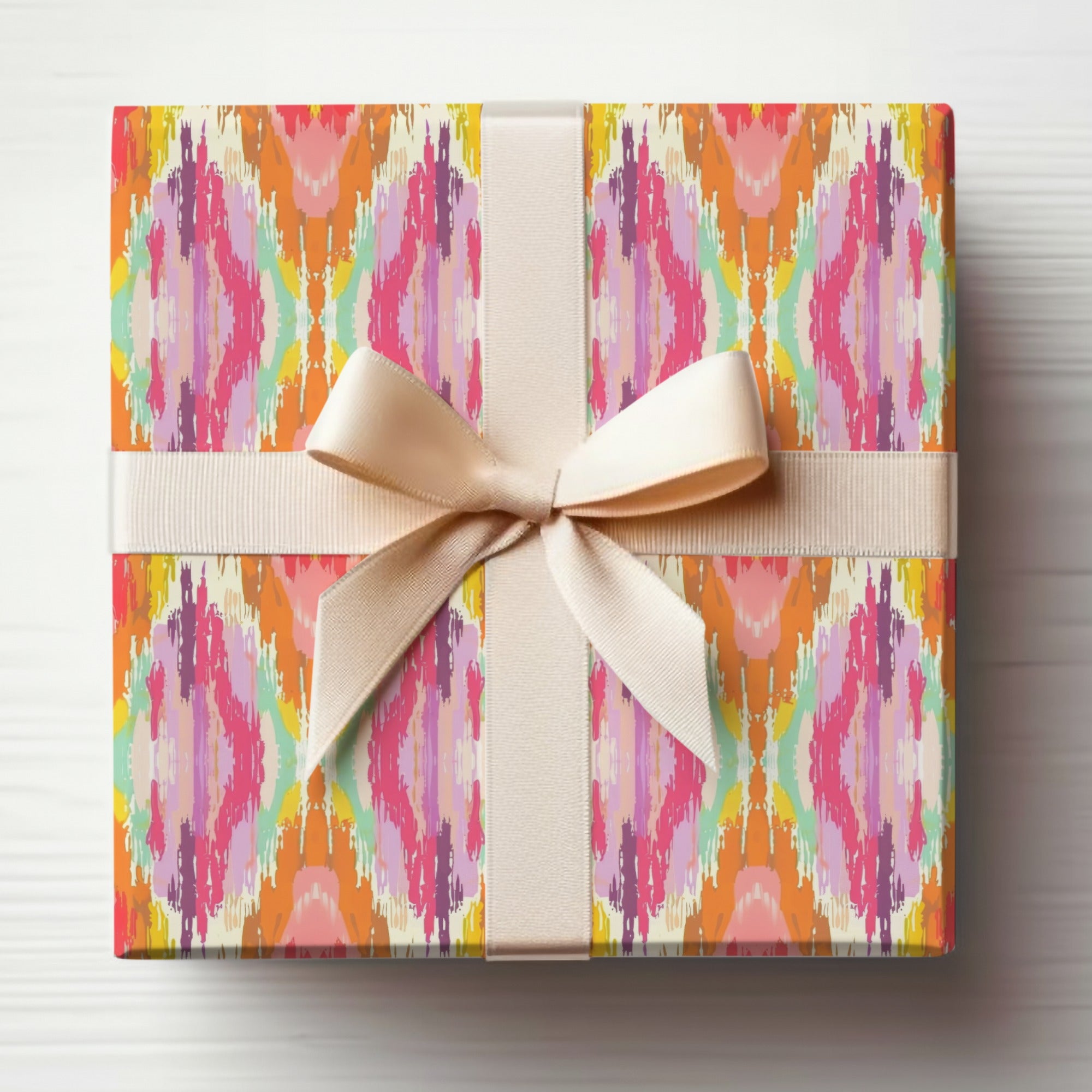 Vibrant Patterned Gift Box with Elegant Ribbon Wrap