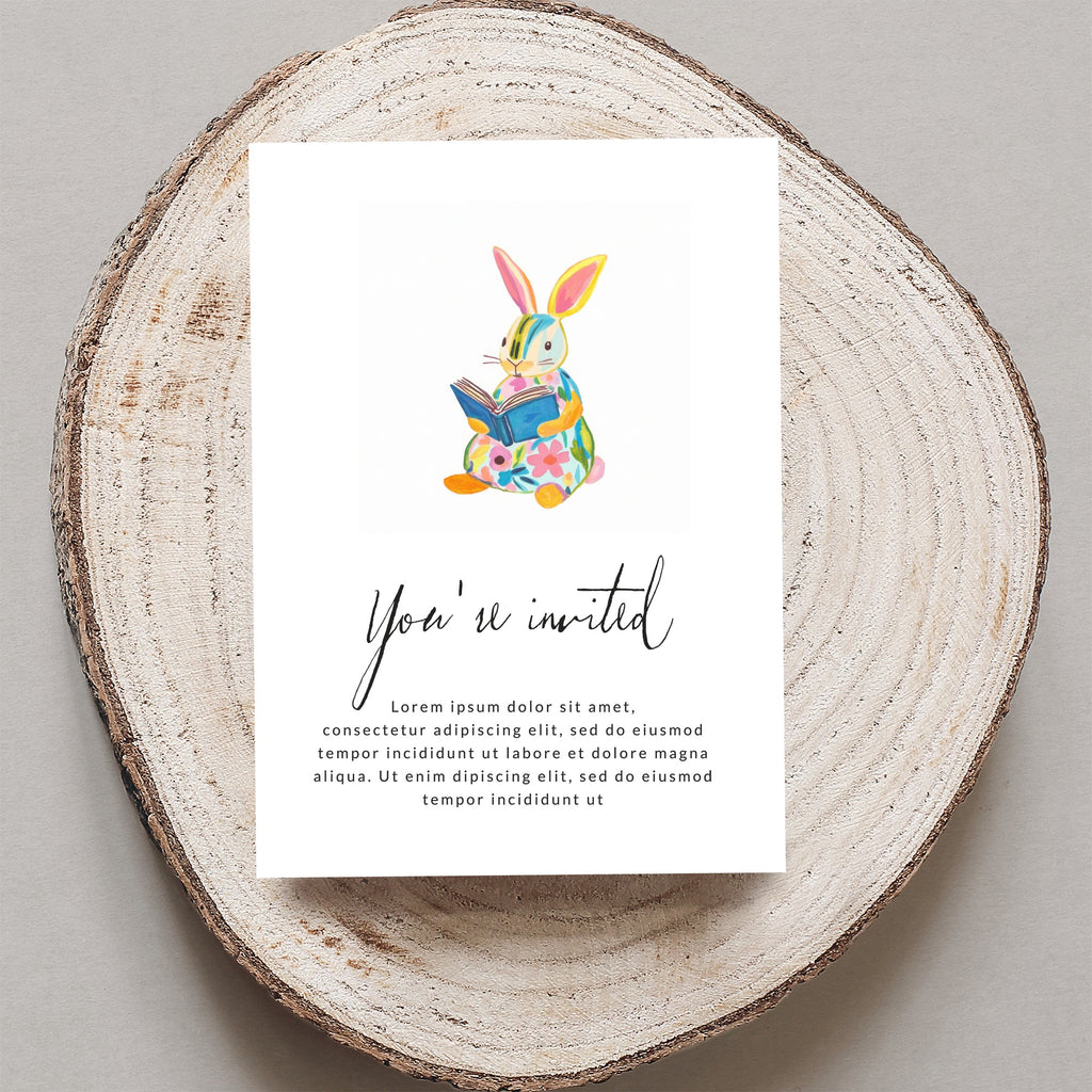 Invitation card with a colorful bunny reading a book, "You're invited" text.