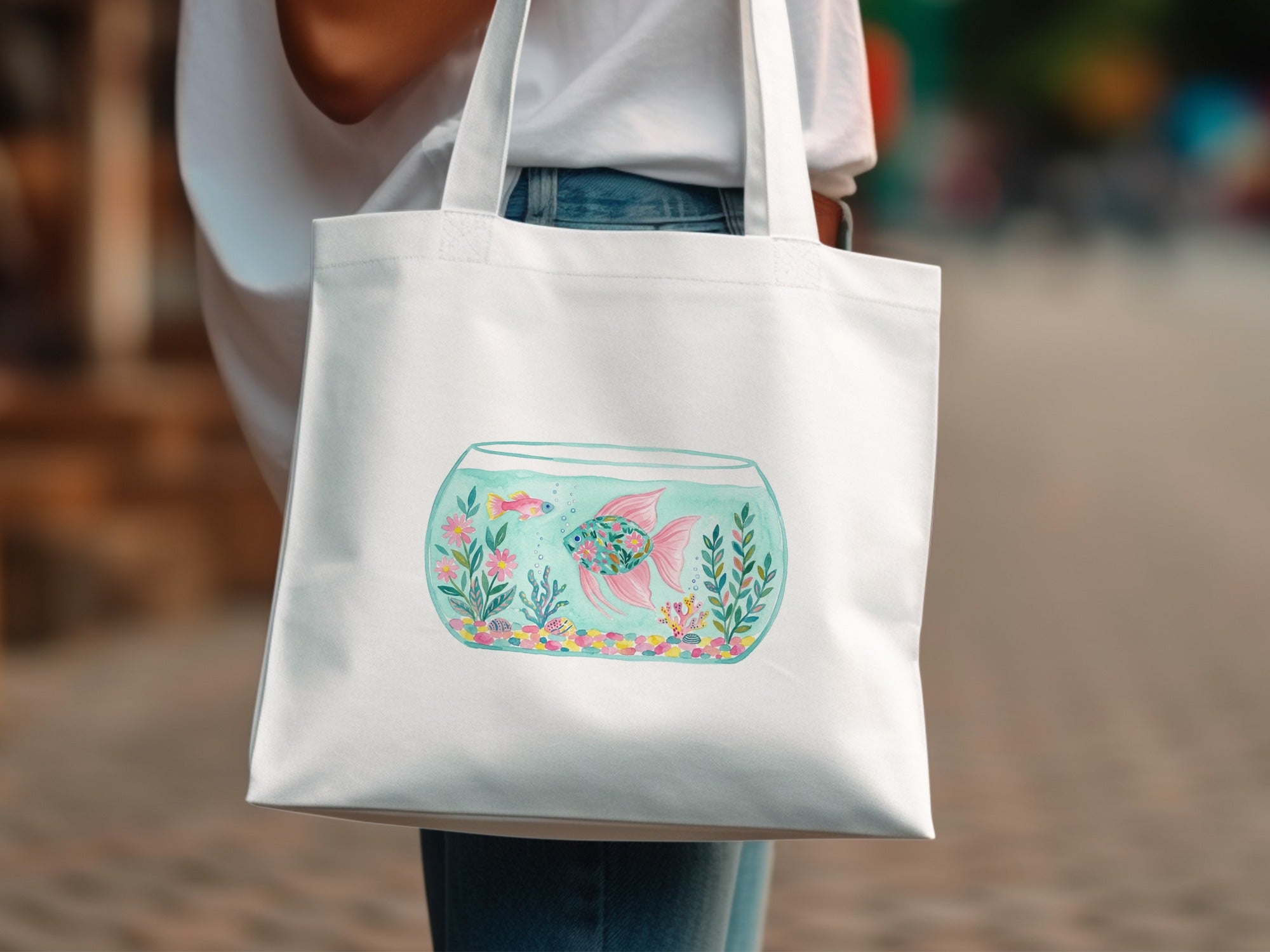 White tote bag with a watercolor illustration of a goldfish in a bowl.