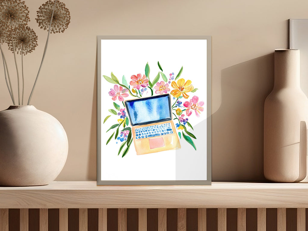 Watercolor painting of an open laptop with colorful flowers.