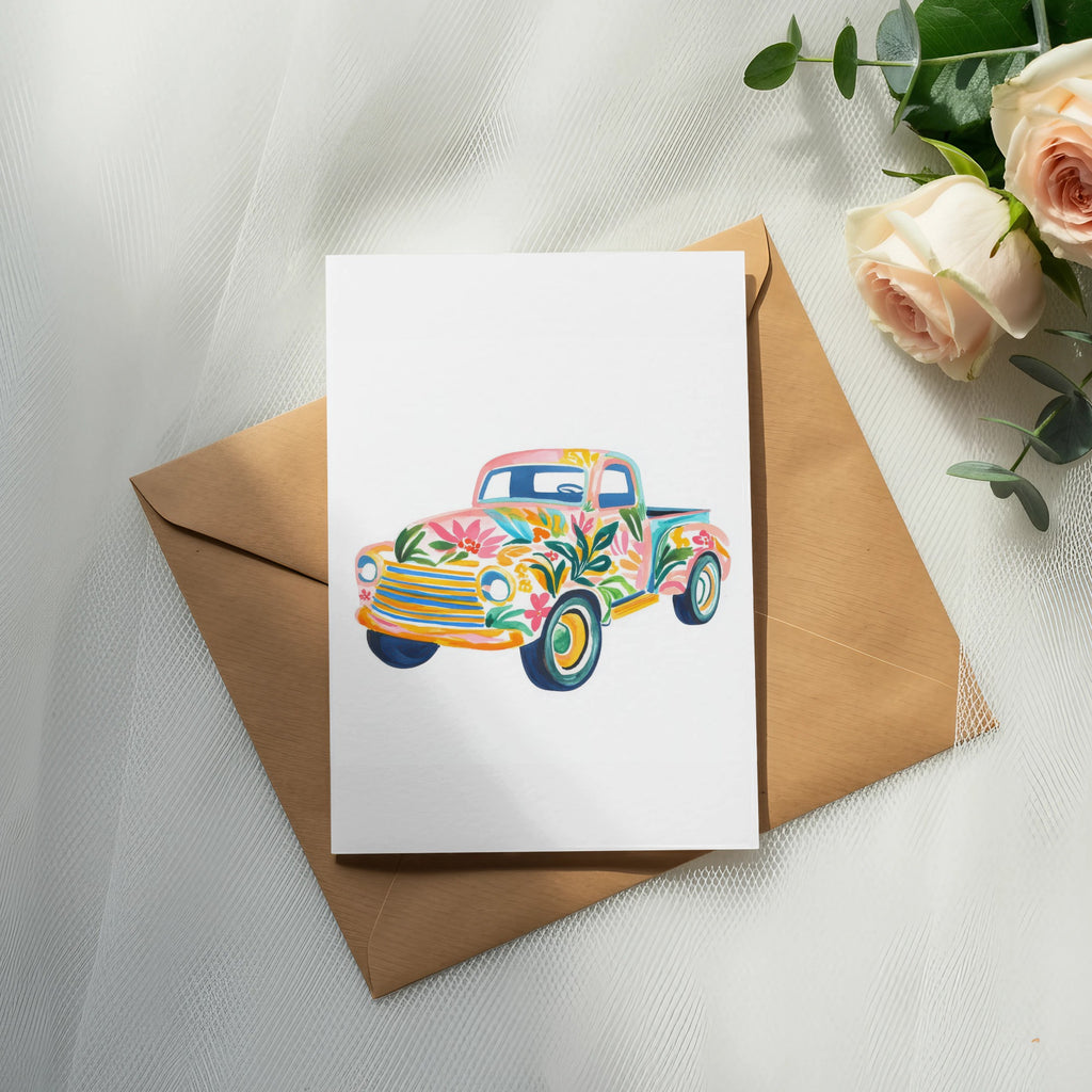 Card with floral-patterned truck design on brown envelope.