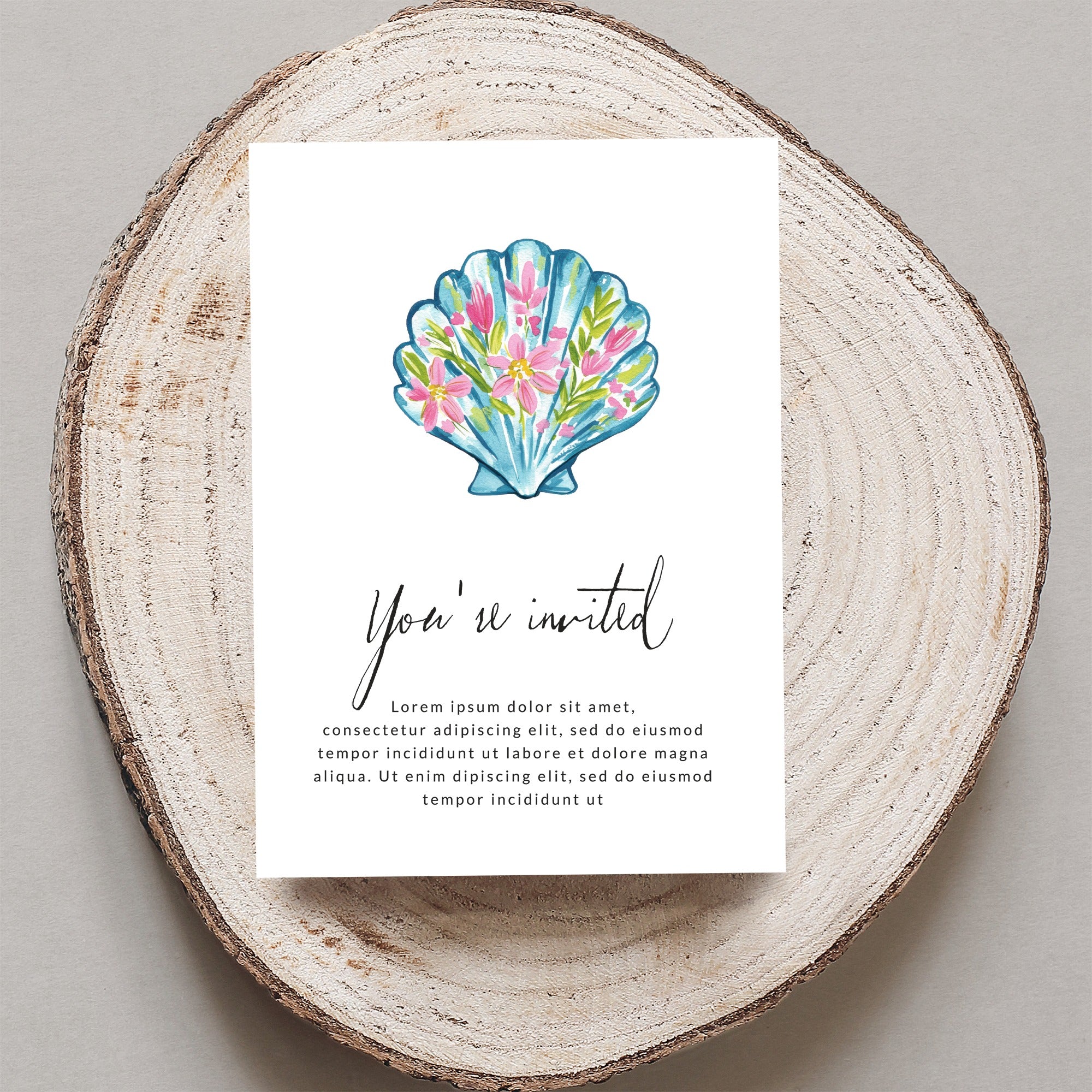 Invitation card with watercolor seashell illustration and "You're invited" text.