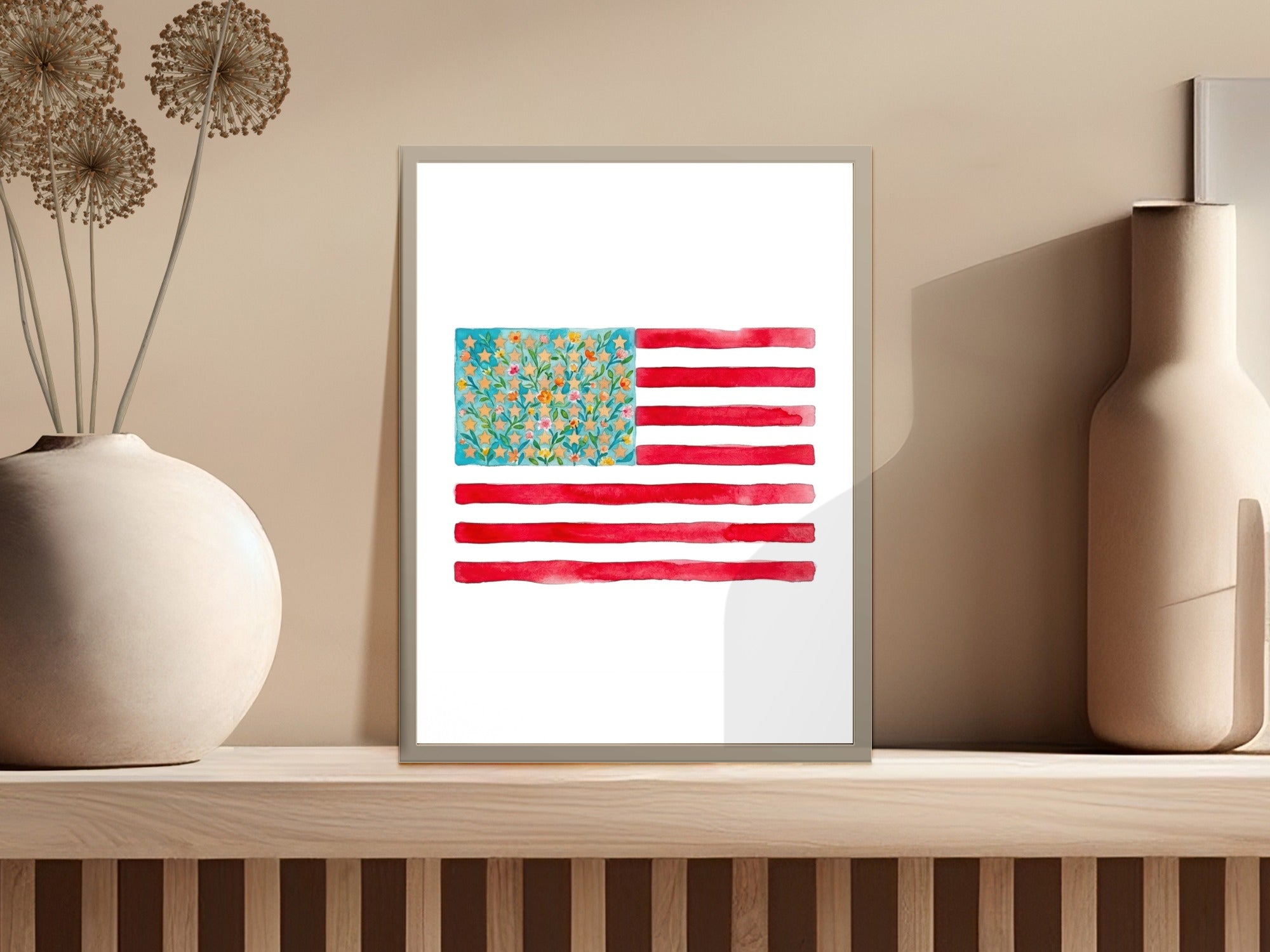 American flag with floral watercolor pattern on a shelf.