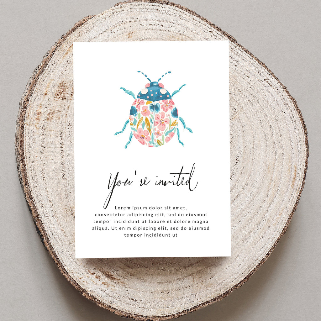 Watercolor invitation card with floral ladybug design and placeholder text.