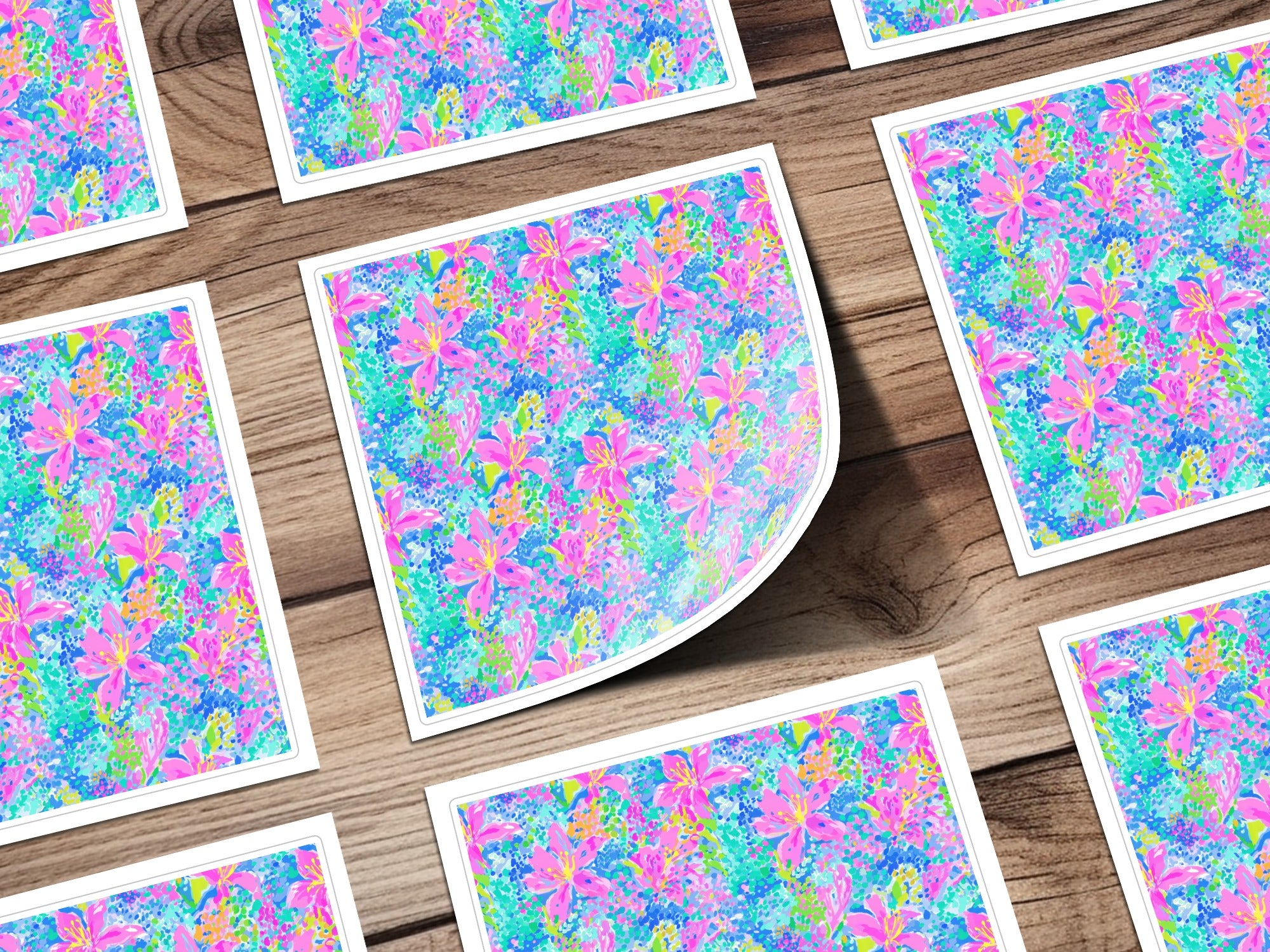 Square cards with a vibrant floral pattern of pink and blue flowers.