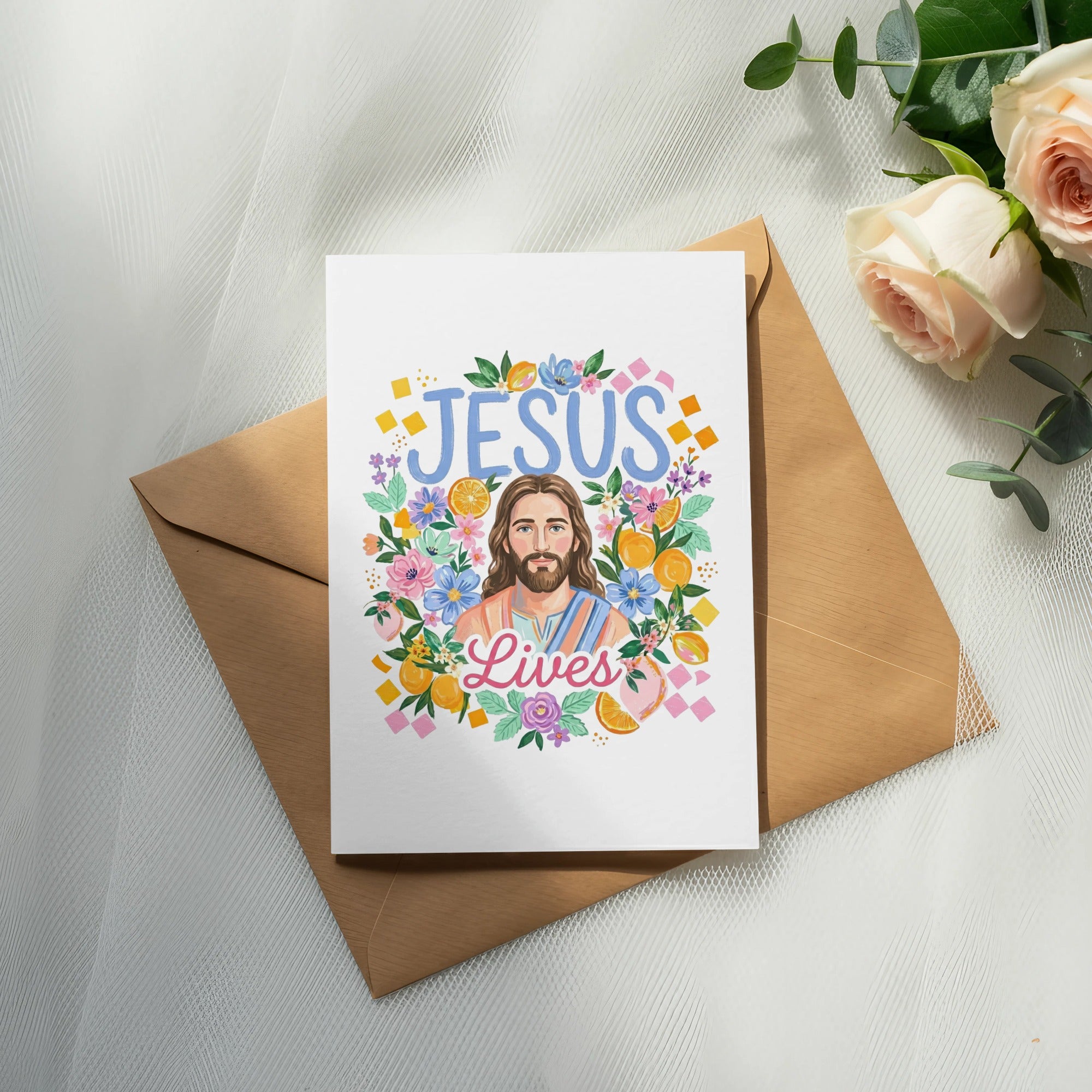 Jesus Lives text surrounded by flowers and oranges on a card.