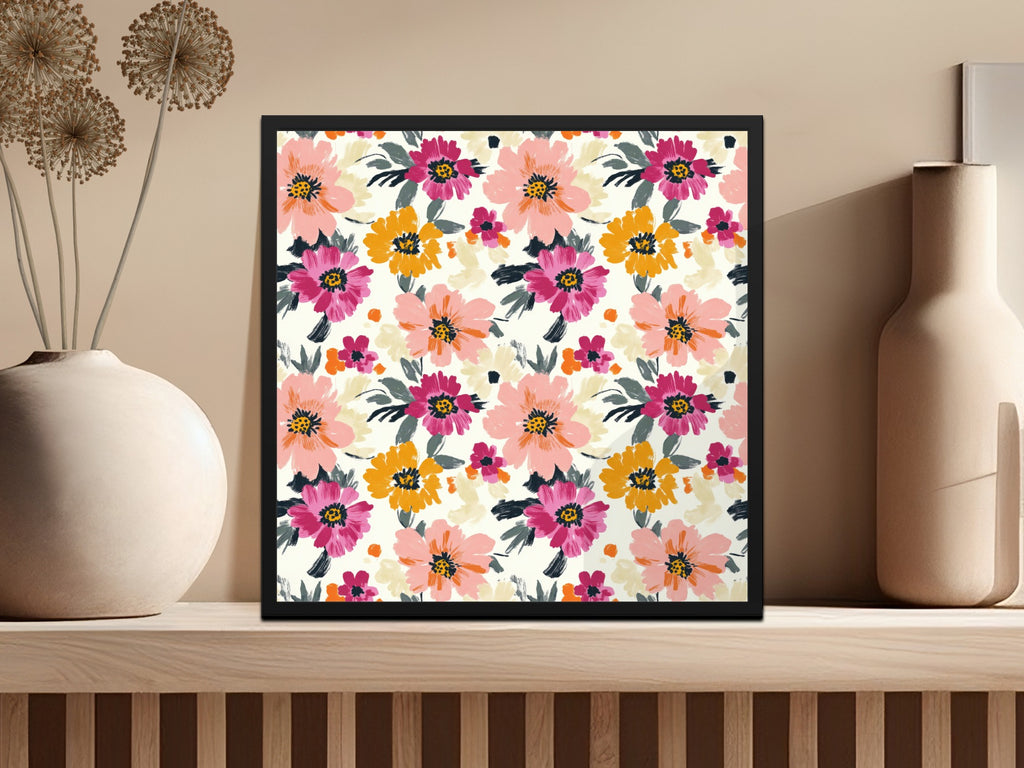 Framed artwork with a vibrant floral pattern of pink, yellow, and magenta flowers.