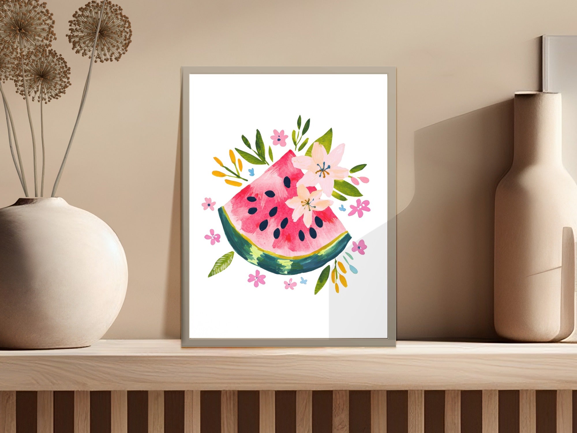 Watercolor illustration of a sliced watermelon with pink flowers and green leaves.