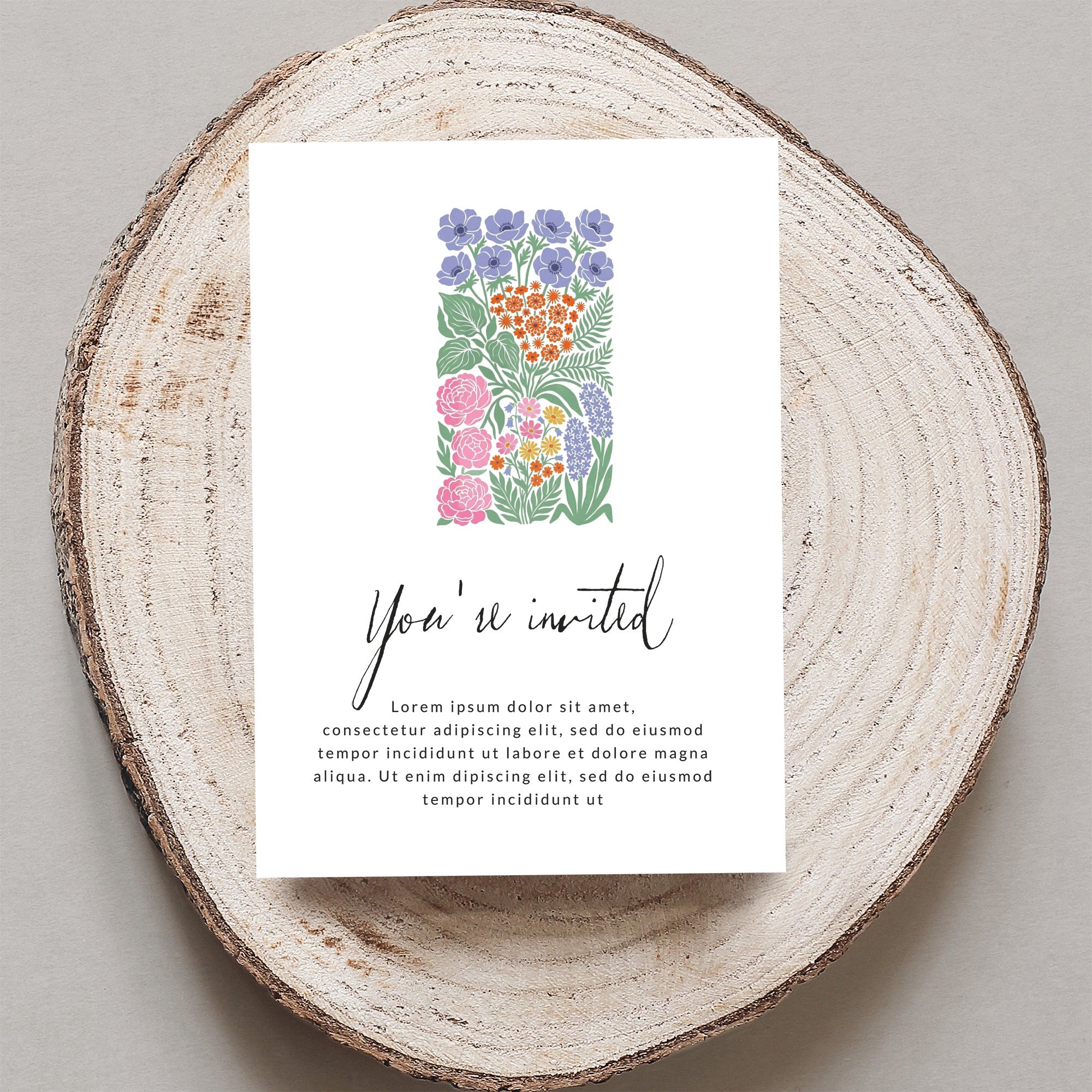 Invitation with floral design and "You're invited" text.