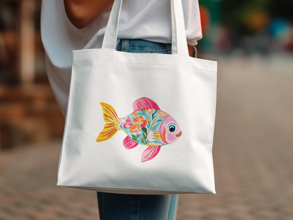 White tote bag featuring a colorful floral fish illustration.