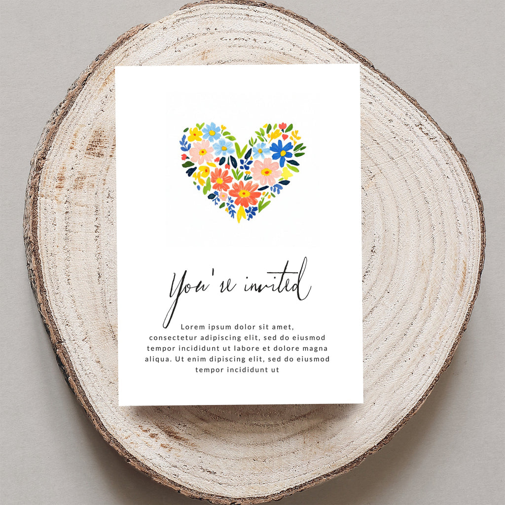 Invitation card with "You're invited" and floral heart design.