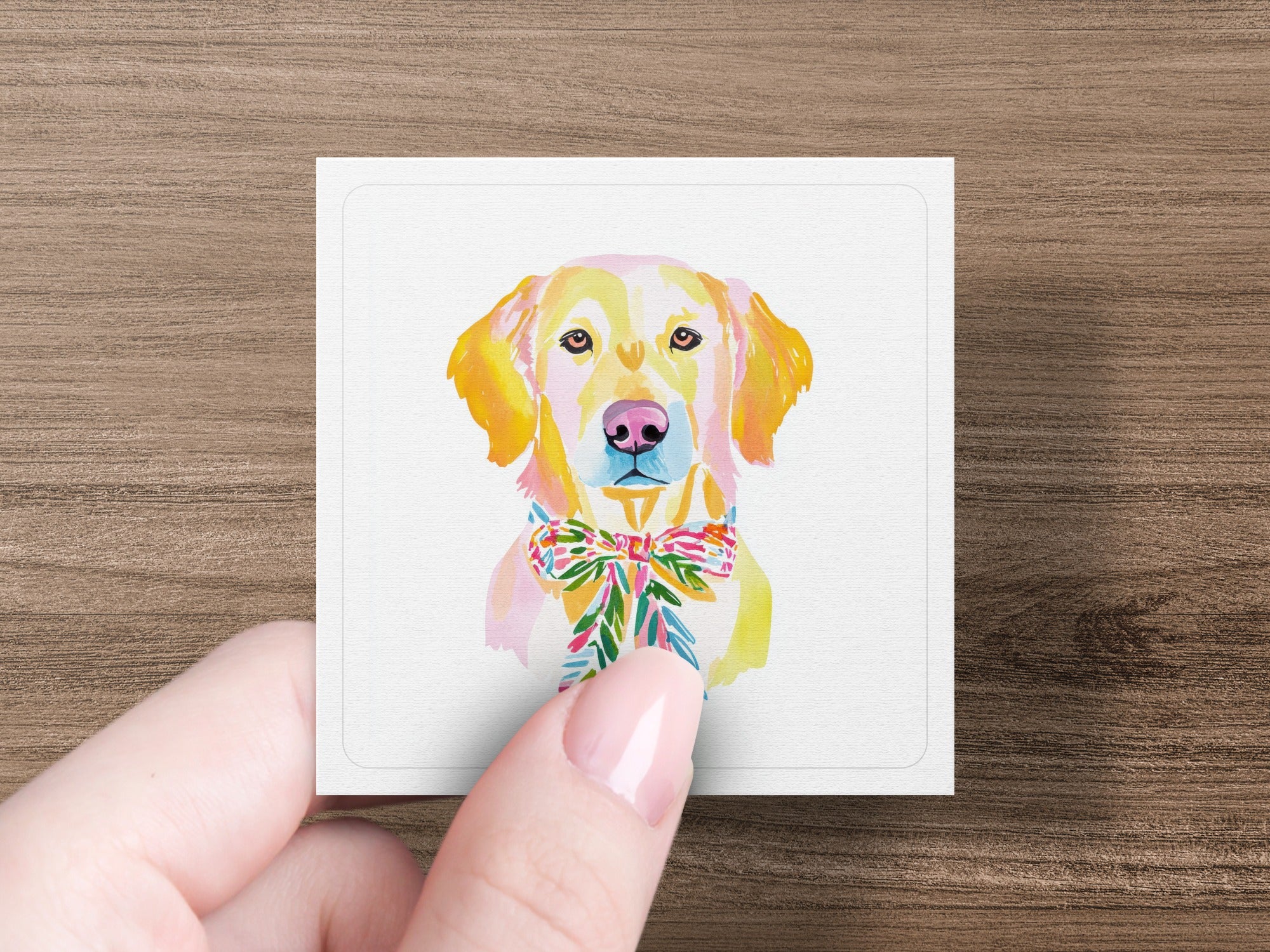 Watercolor golden retriever wearing a colorful bow tie.