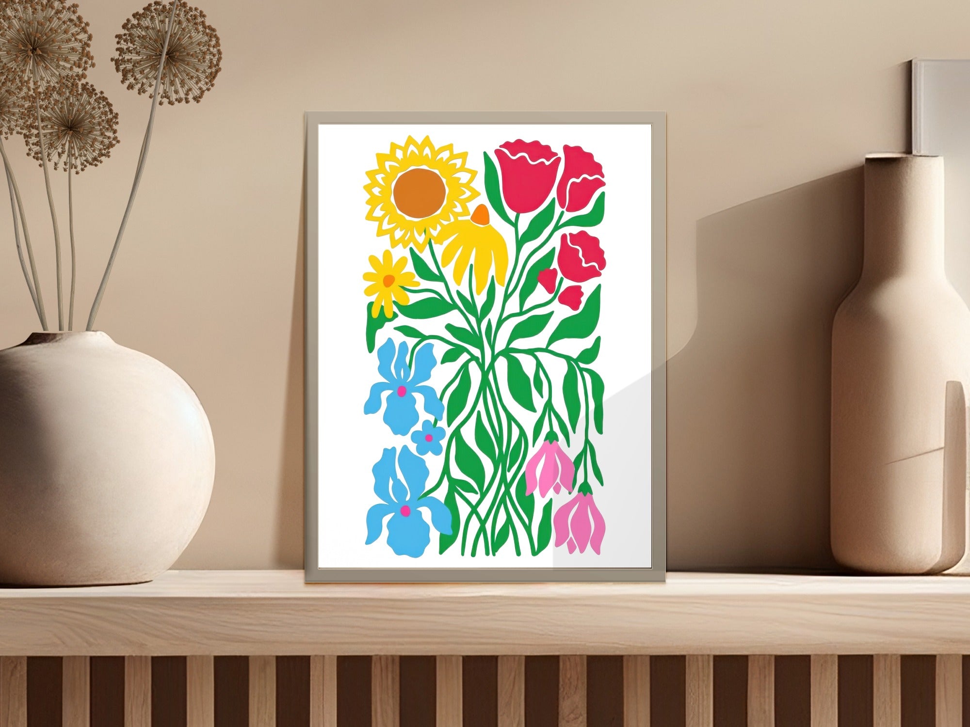 Framed floral artwork with sunflowers, roses, and blue and pink tulips.