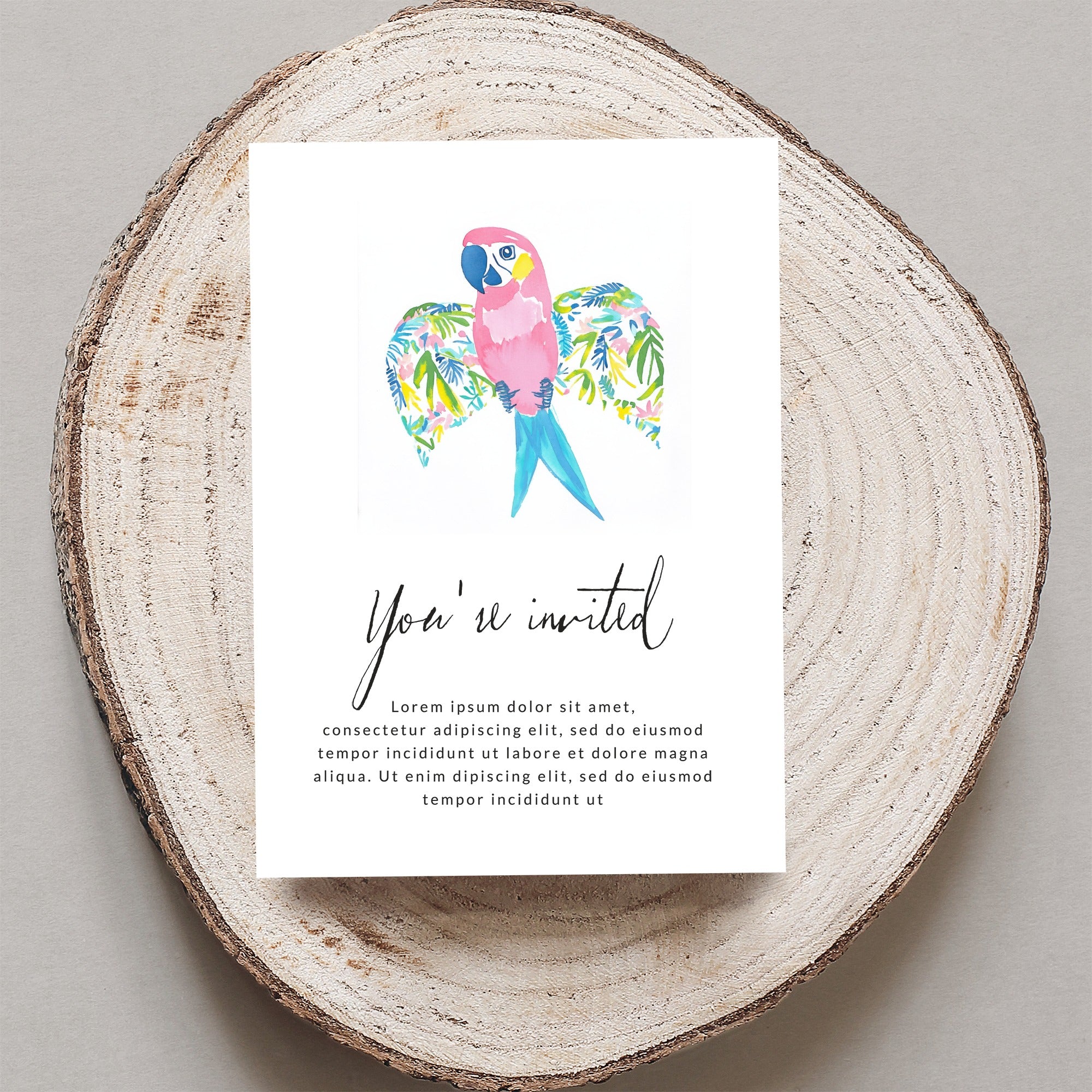 Invitation card with watercolor parrot and placeholder text.
