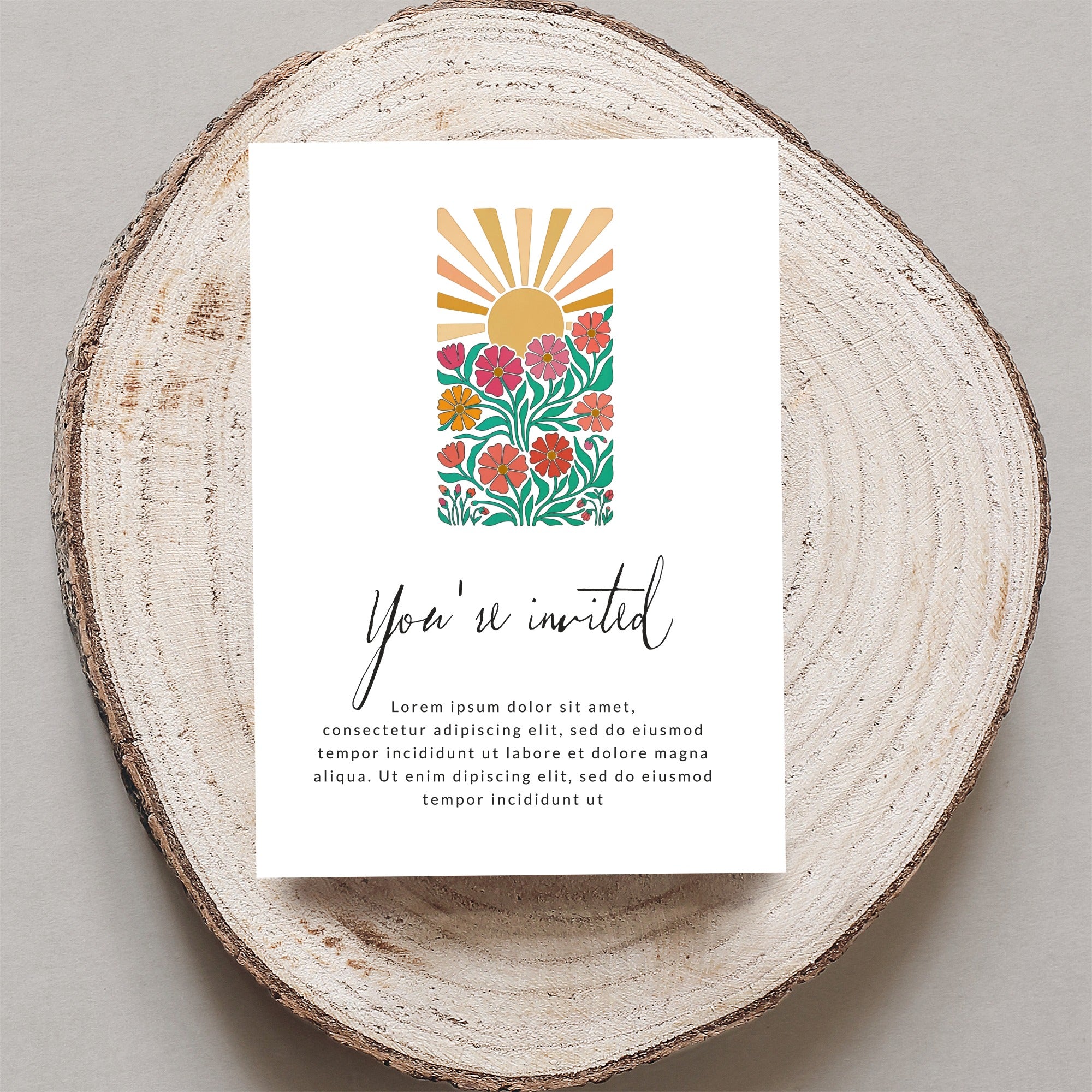 Greeting card with floral sunburst and "You're invited" text.
