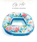 Blue and white floral inflatable pool float with text "Clip Art" and "BY MOORE & MOUNTAIN".