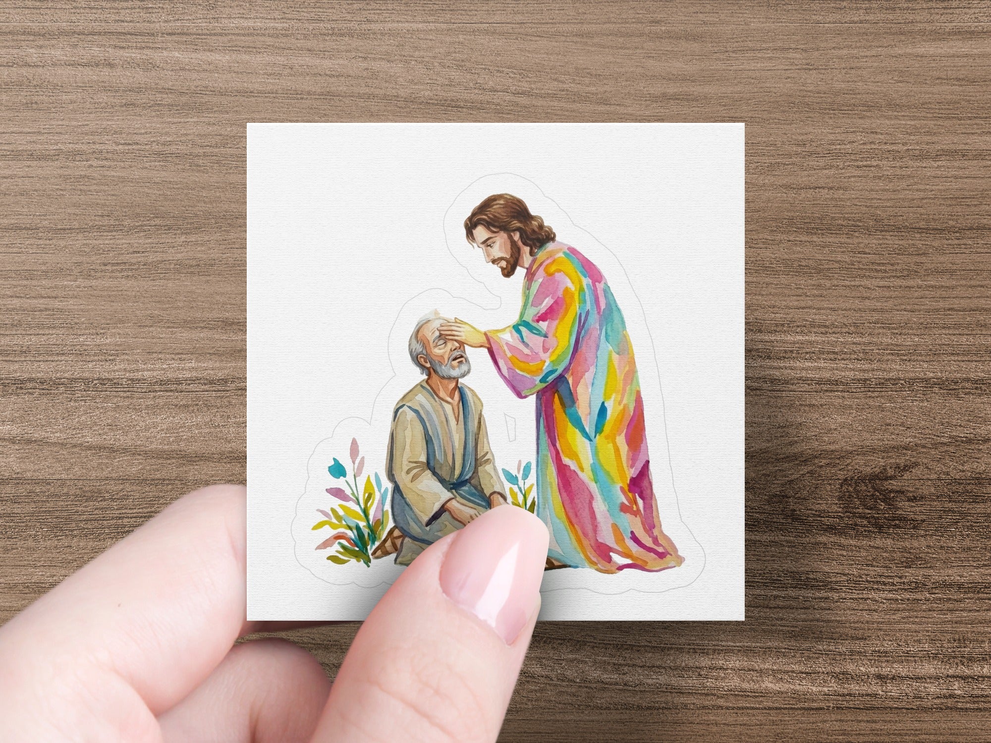 Jesus gently touches a kneeling man's forehead in colorful robe.