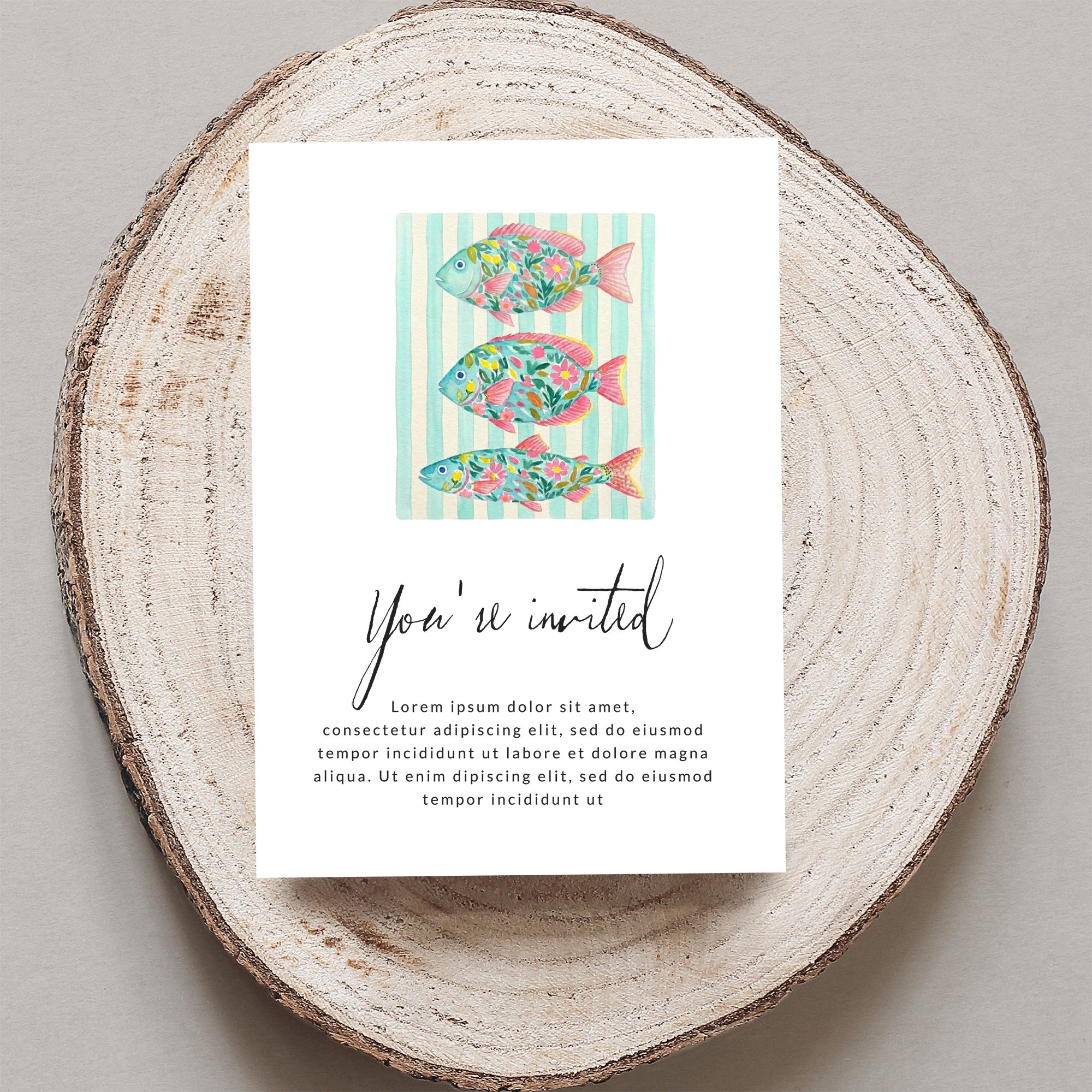 Card with three decorative fish and "You're invited" text.