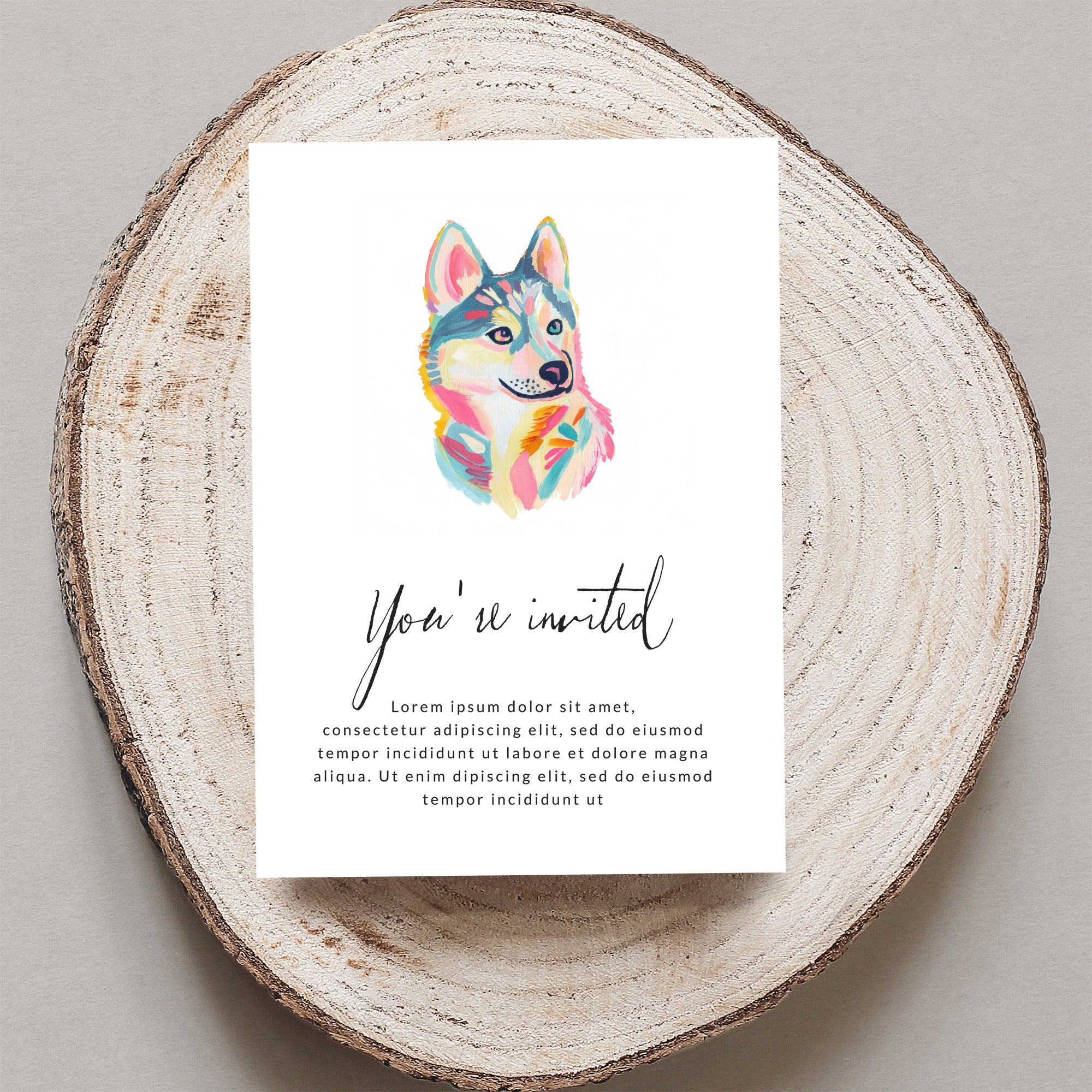 Card with colorful dog illustration and "You're invited" text.