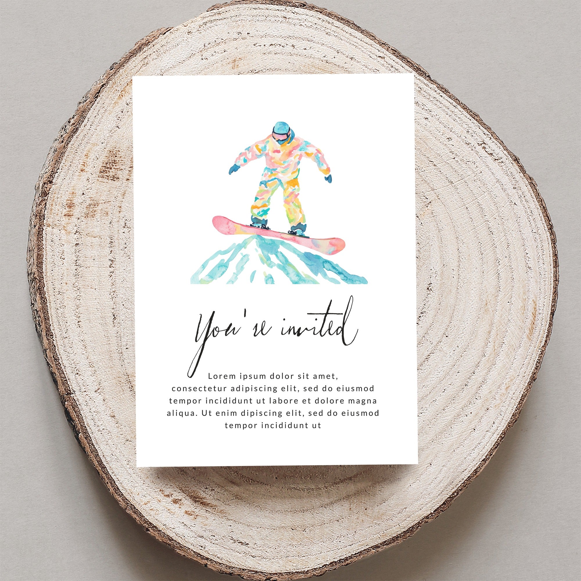 Watercolor snowboarder invitation with "You're invited" text.