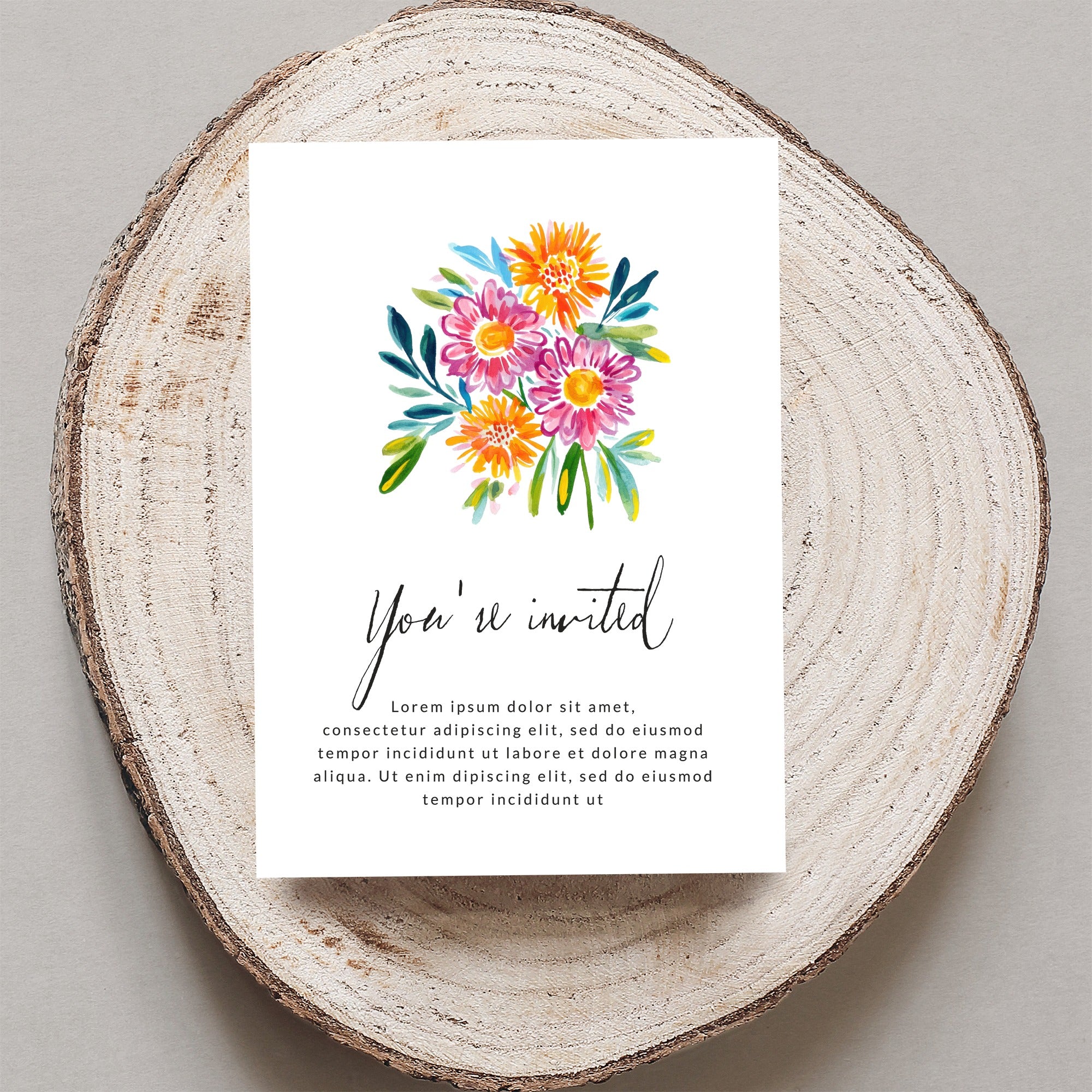 Invitation card with watercolor flowers and "You're invited" text.