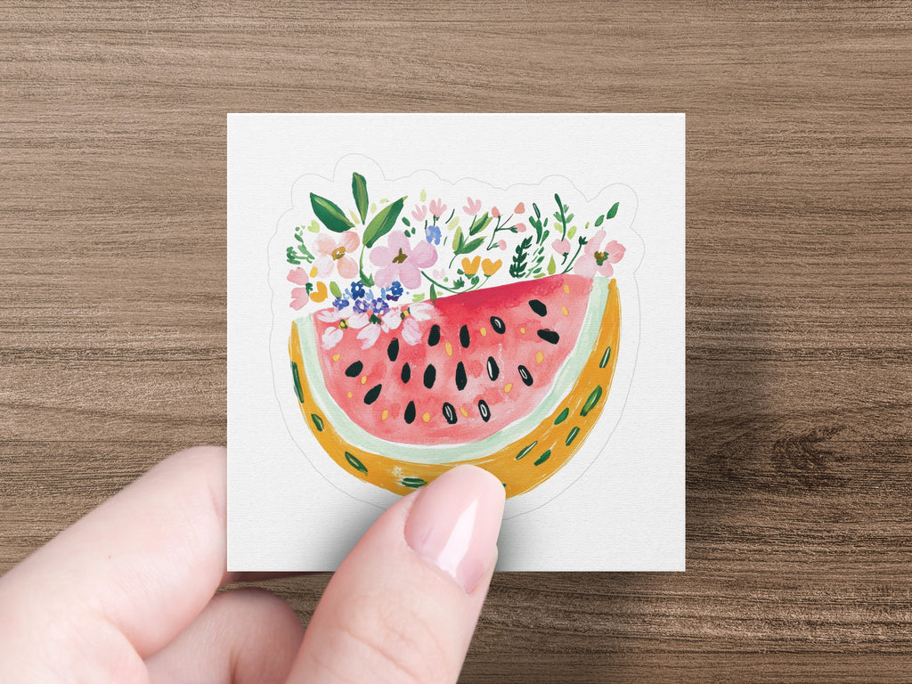 Watercolor slice of watermelon with a floral bouquet on a white background.