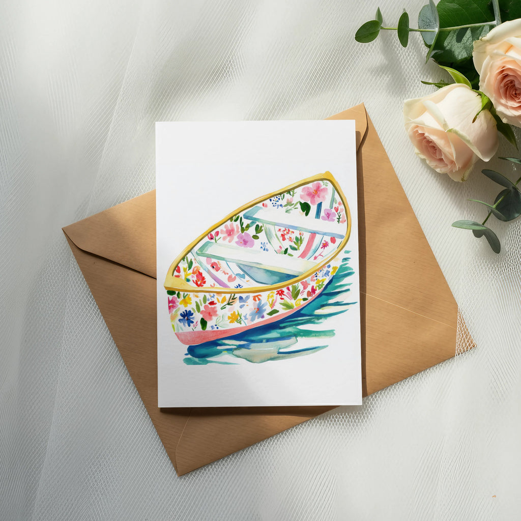 Card with floral boat illustration on a brown envelope, with roses.