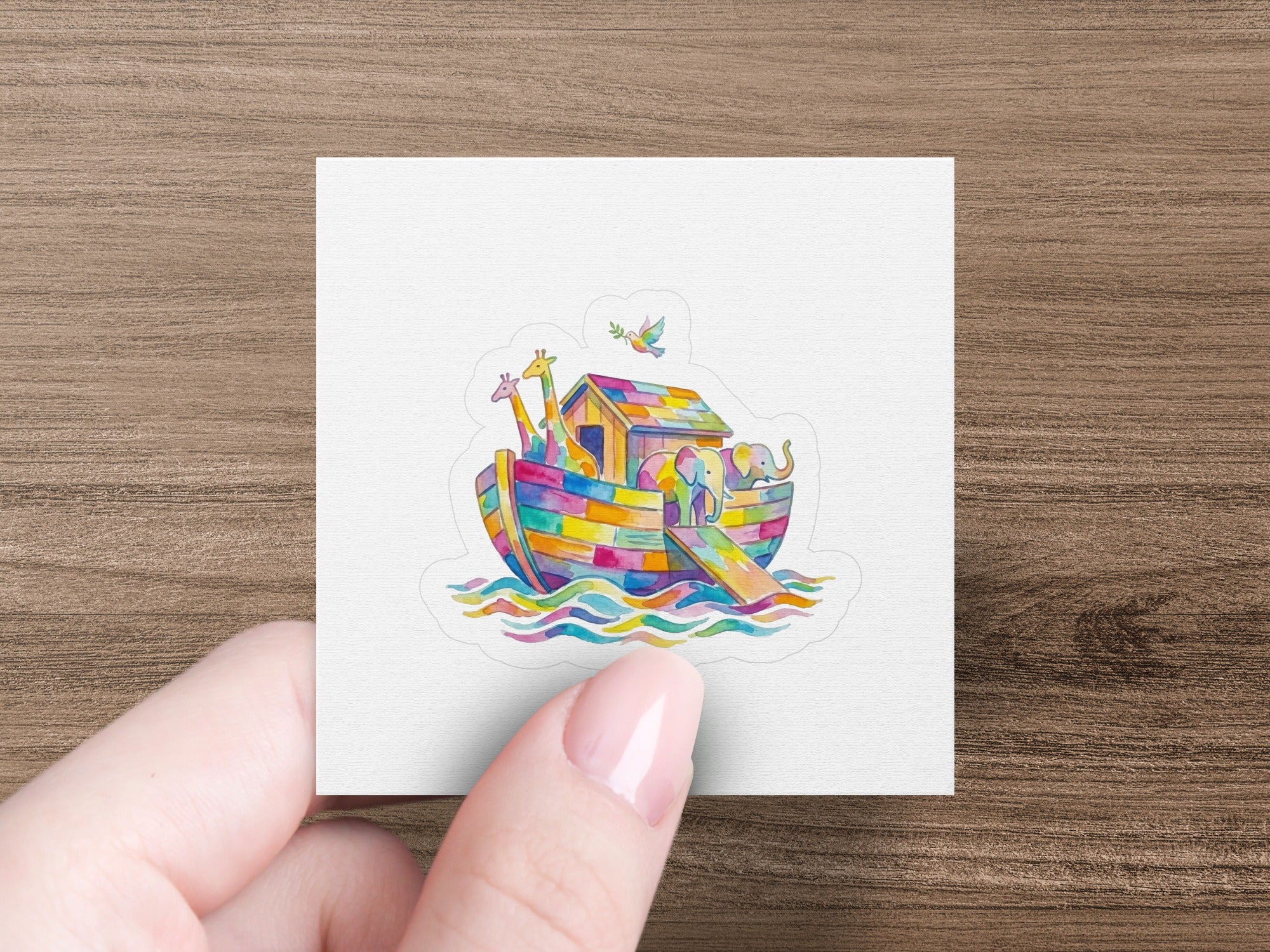 Colorful Noah's Ark with animals on wavy blue sea.