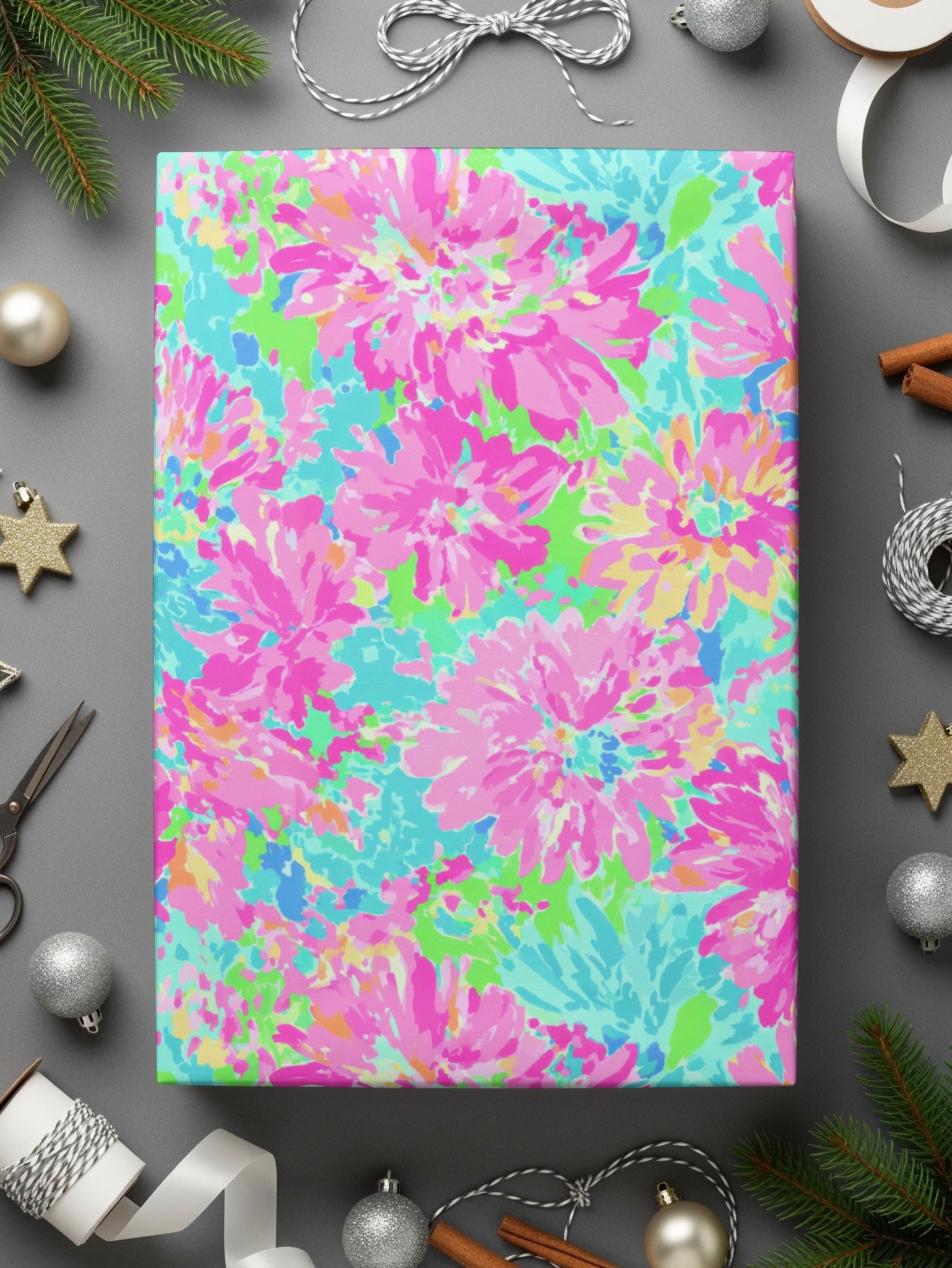 Bright floral wrapping paper with pink, yellow, and teal blooms.