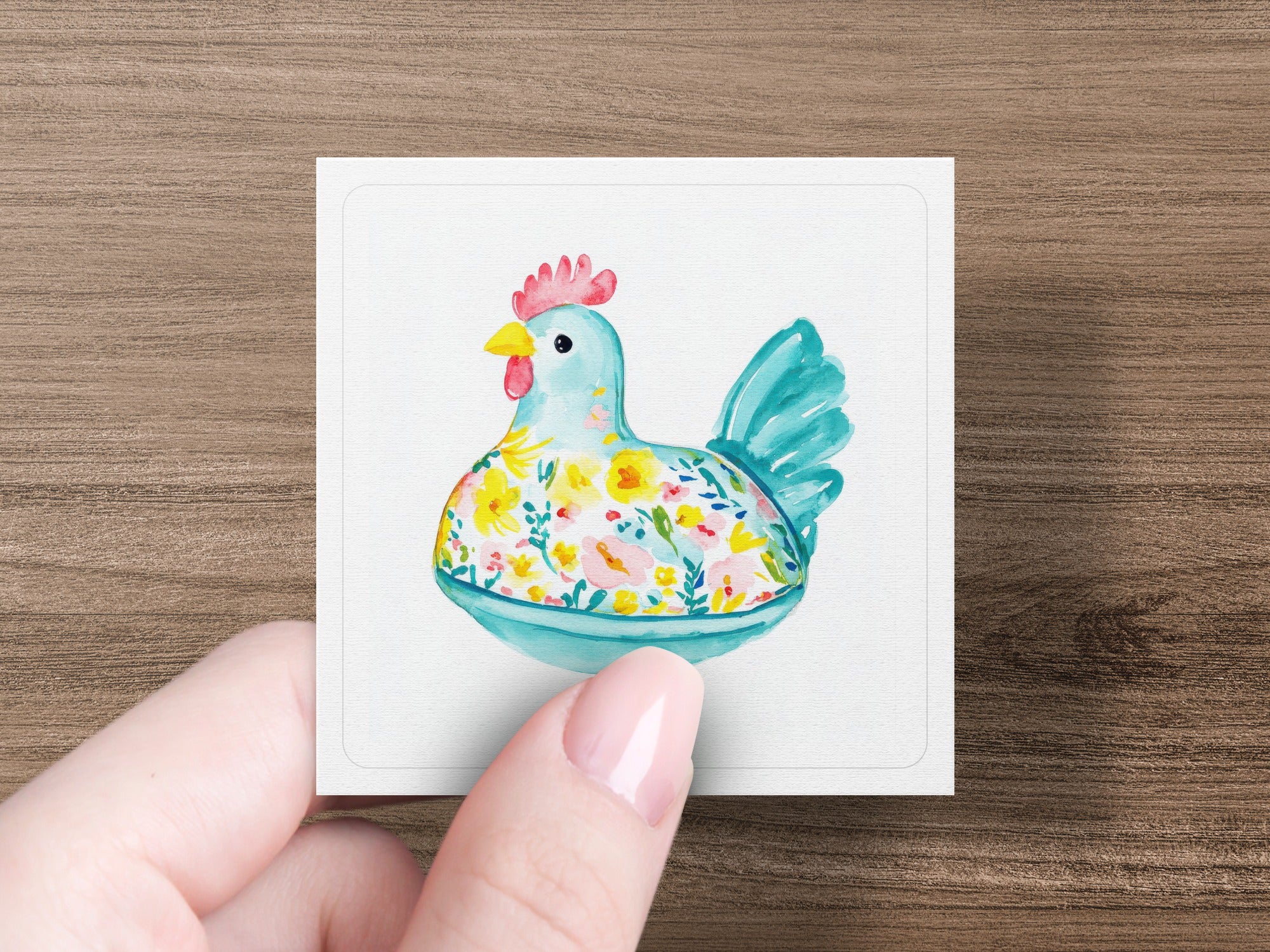 Watercolor chicken illustration with floral pattern on a square card.