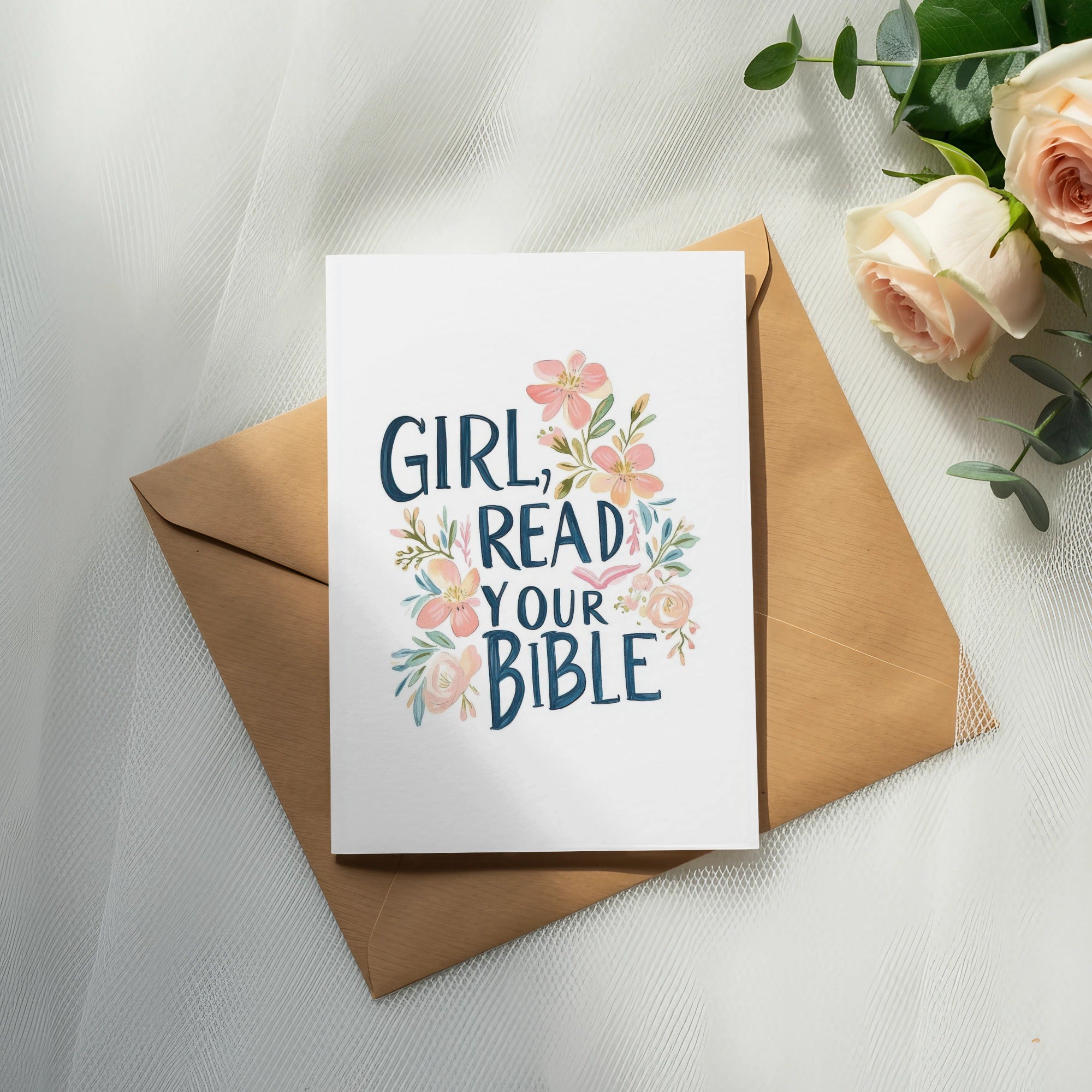 Greeting card with "Girl, read your Bible" text and floral design on an envelope.