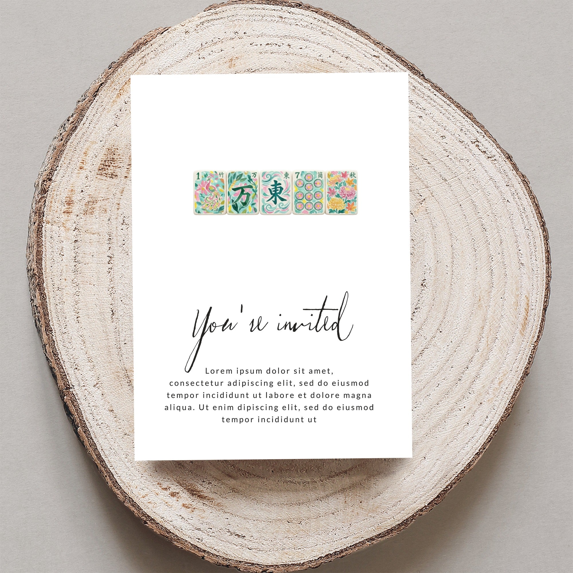 Invitation card with floral tiles, "You're invited" text, and placeholder lorem ipsum.