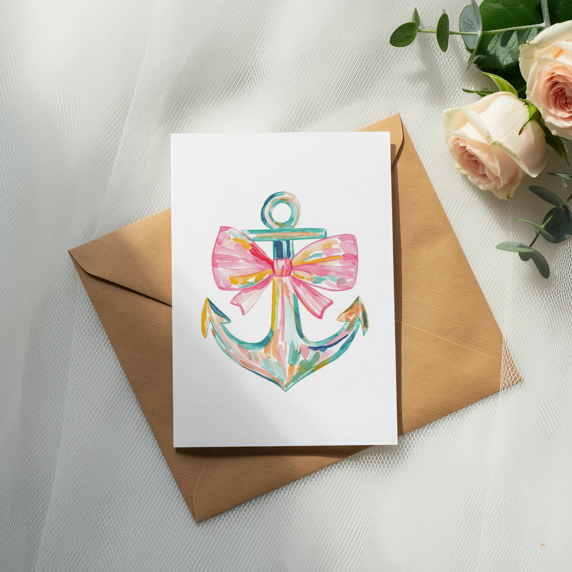 Watercolor anchor with pink bow on white card within a brown envelope.