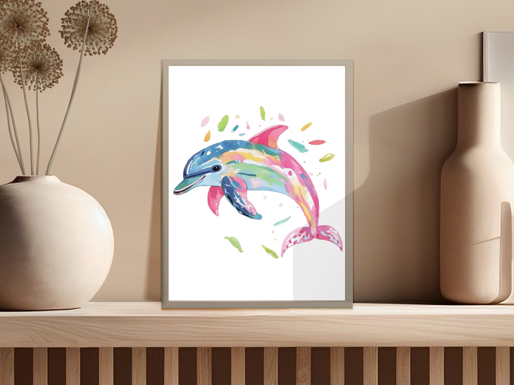 Colorful watercolor dolphin swimming among abstract splashes.